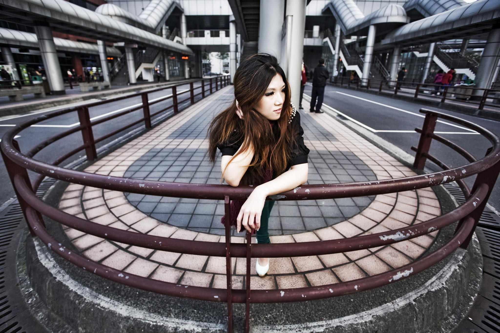 Asian woman posing outdoors near a railing HD Wallpaper