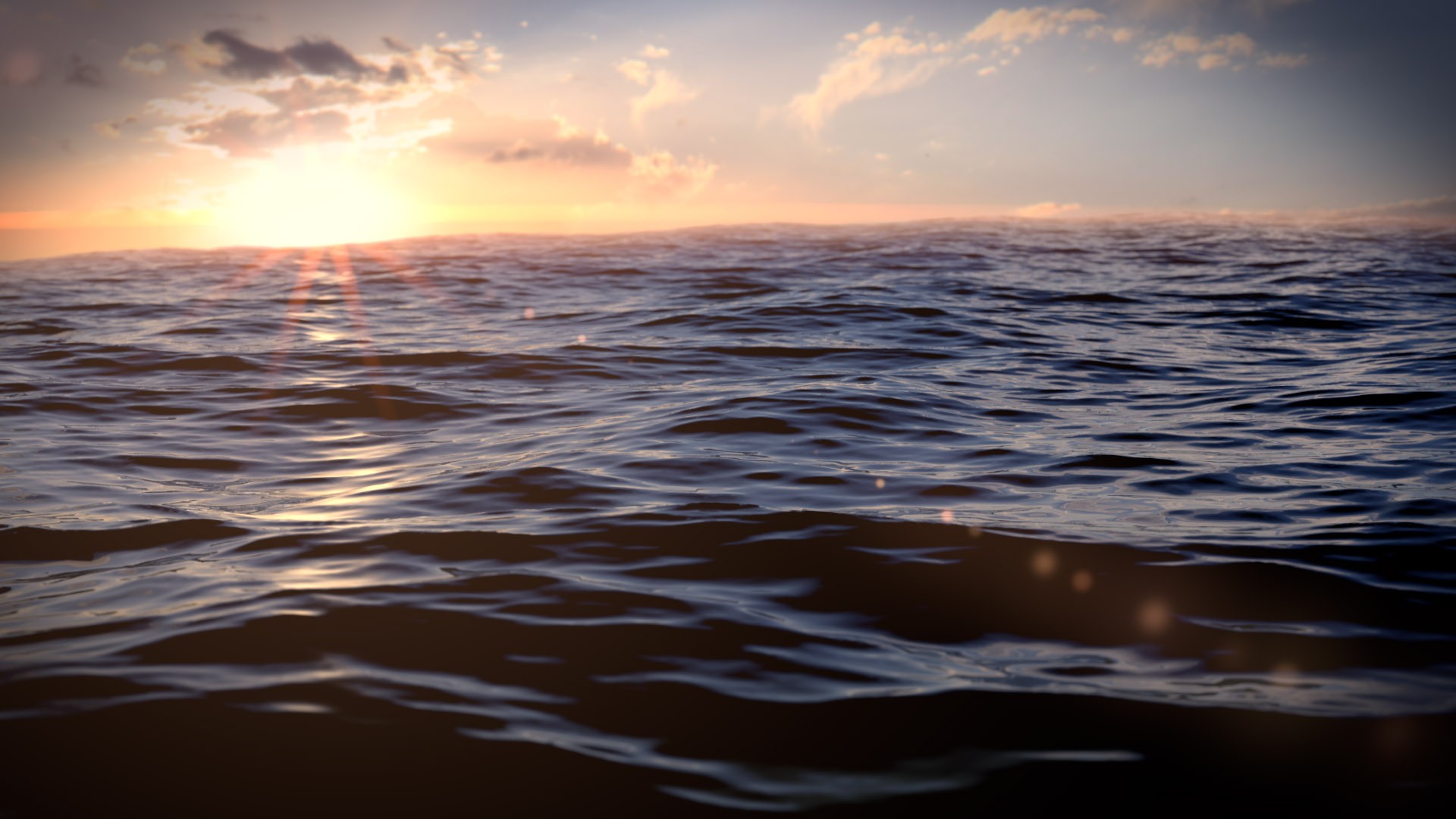 Sunset over the ocean with gentle waves HD Wallpaper