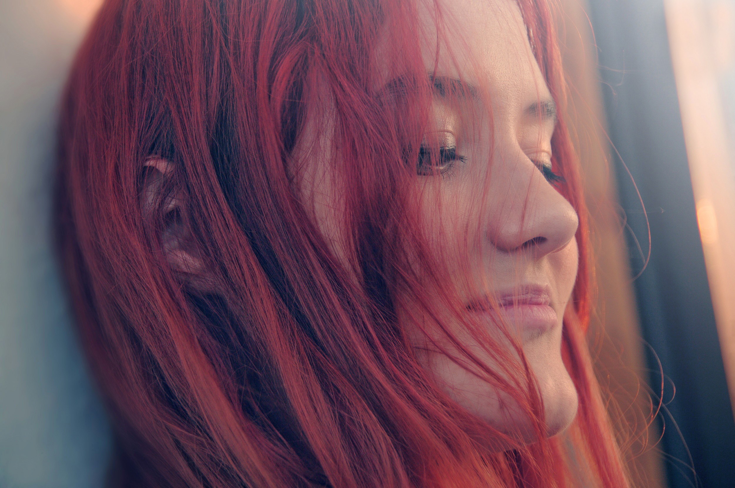 Portrait of a redhead woman with vibrant hair HD Wallpaper