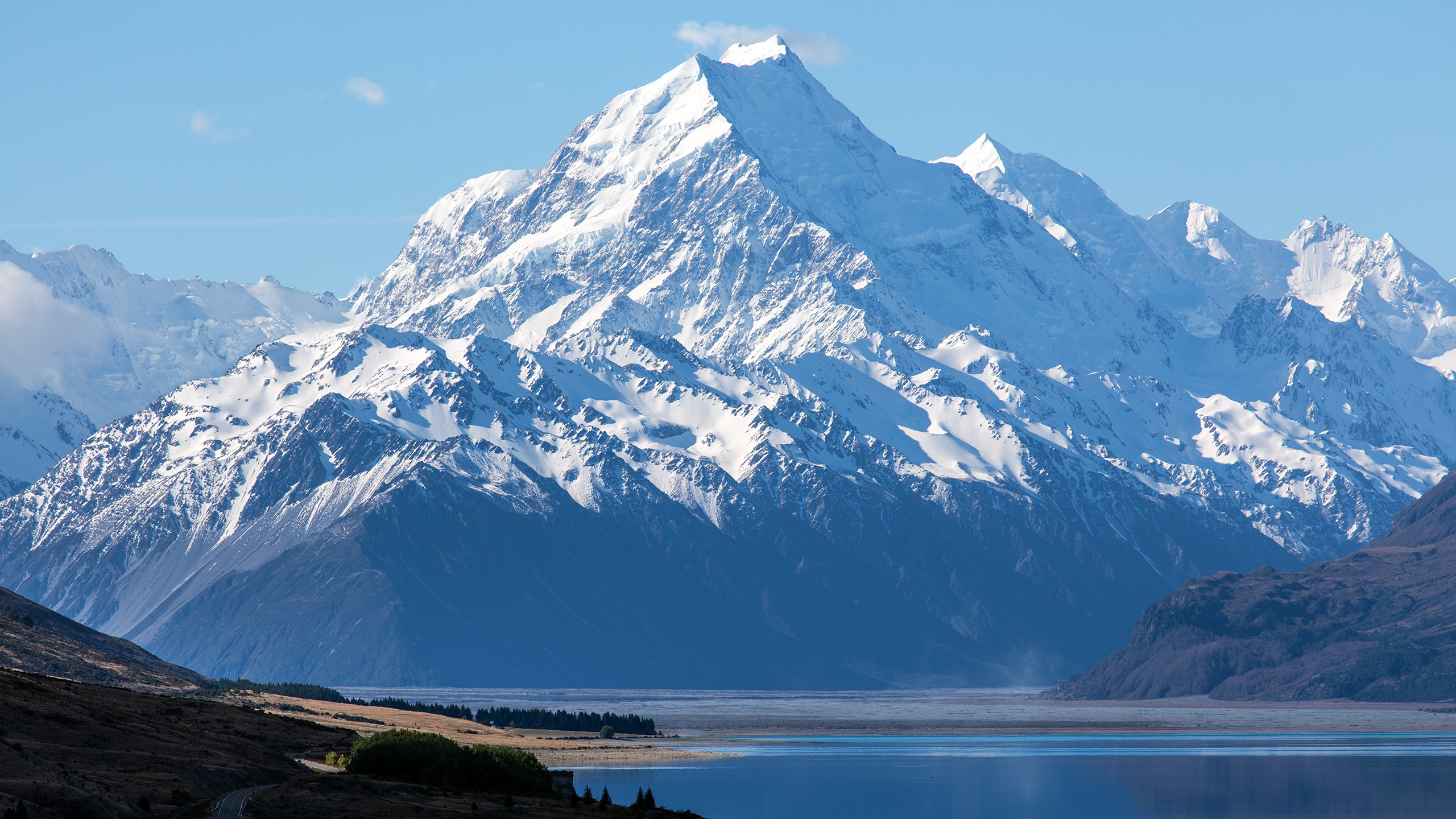 Mount Cook and snowy mountains reflected in a lake HD Wallpaper