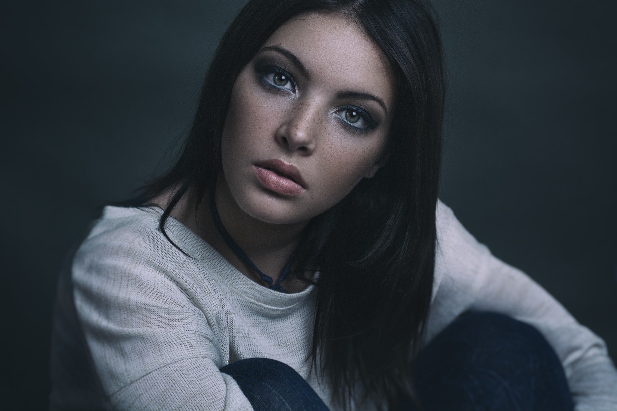 Woman with freckles and dark hair HD Wallpaper