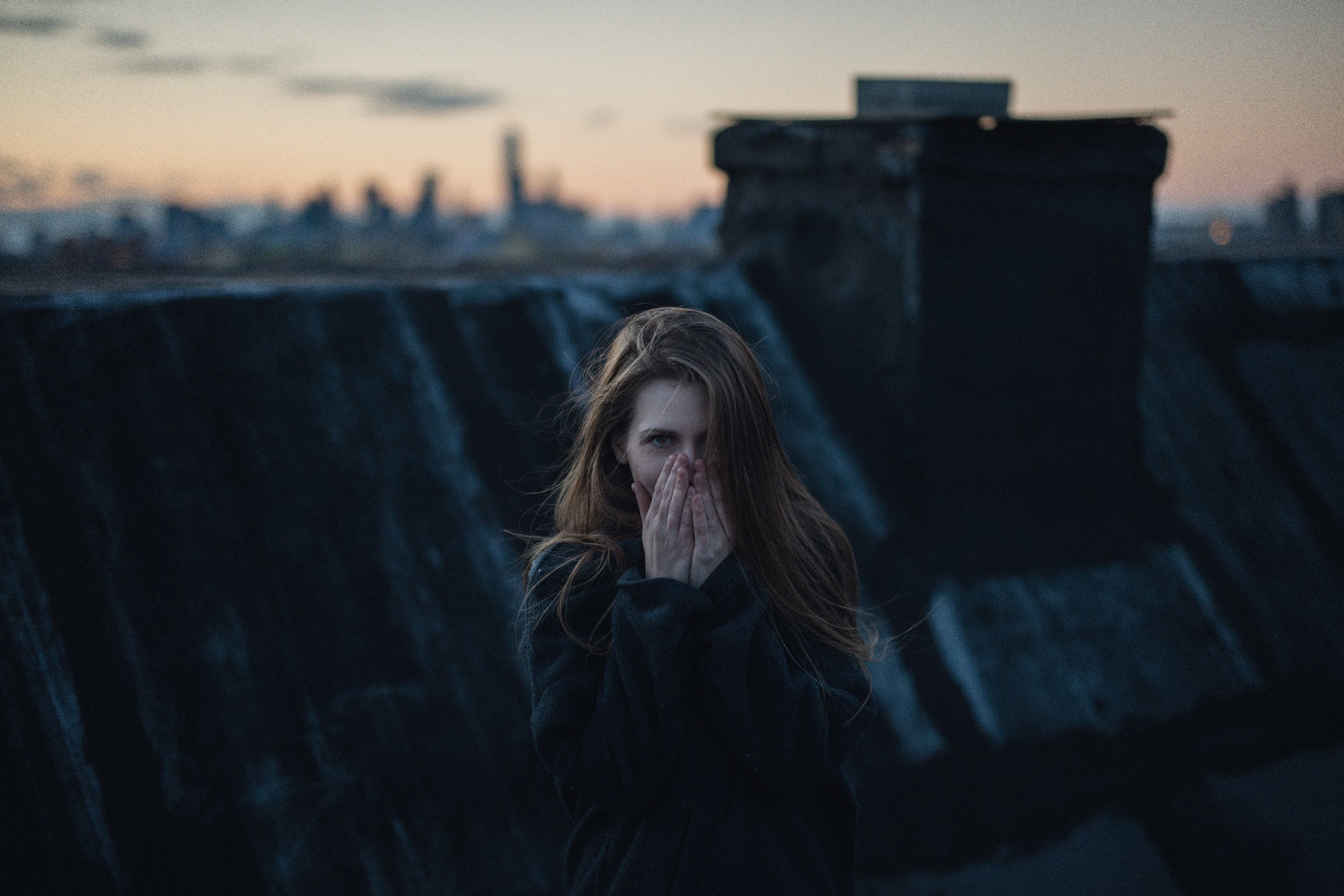 Woman on a rooftop at dusk HD Wallpaper