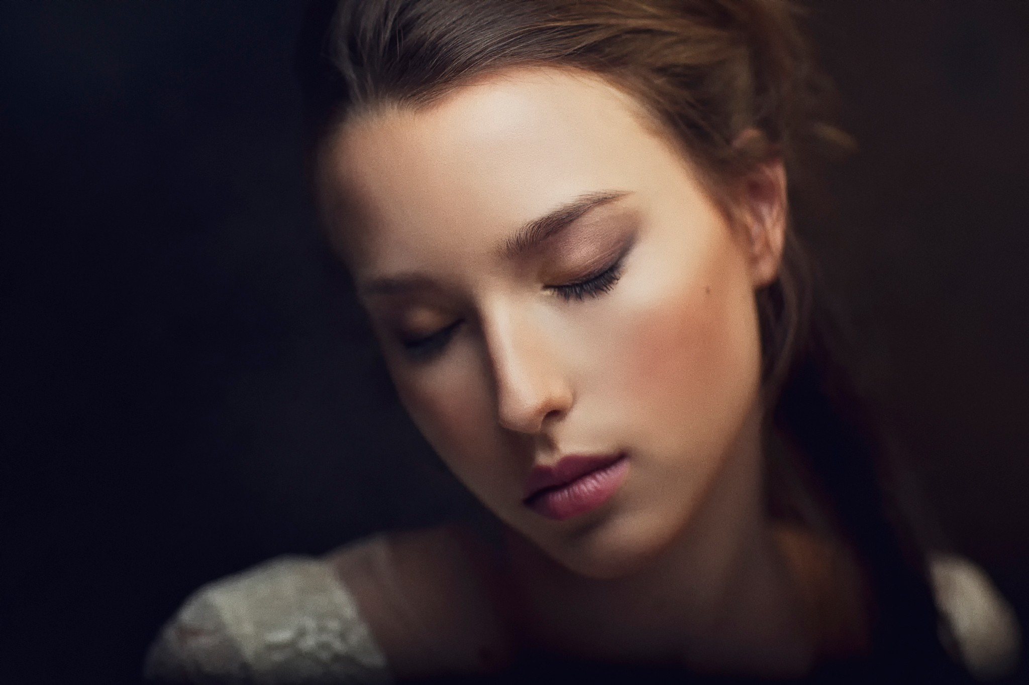 Close-up portrait of a young woman with eyes closed HD Wallpaper