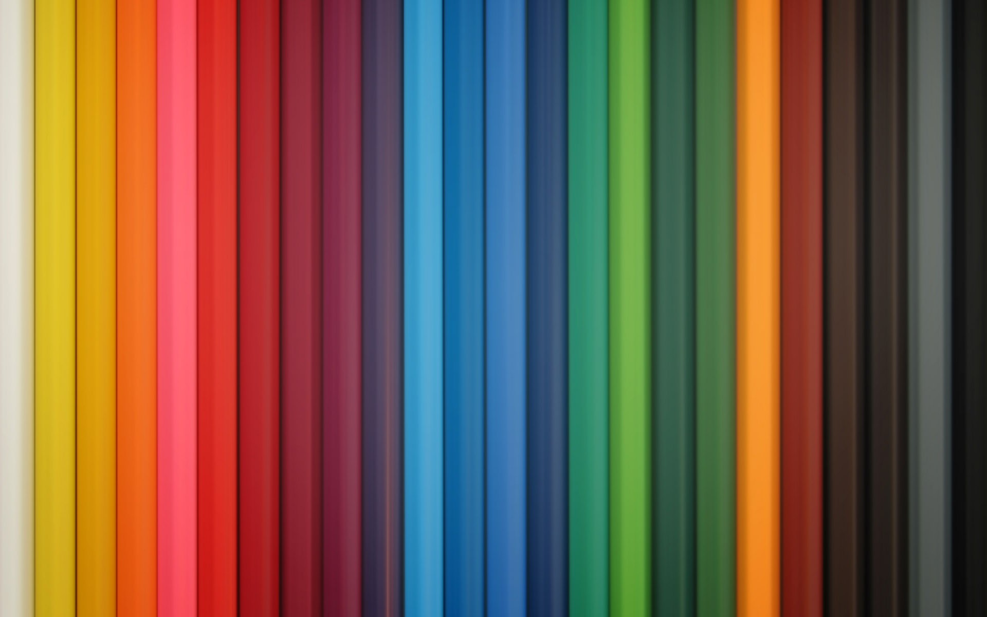 A colorful arrangement of pencils in a rainbow spectrum. HD Wallpaper