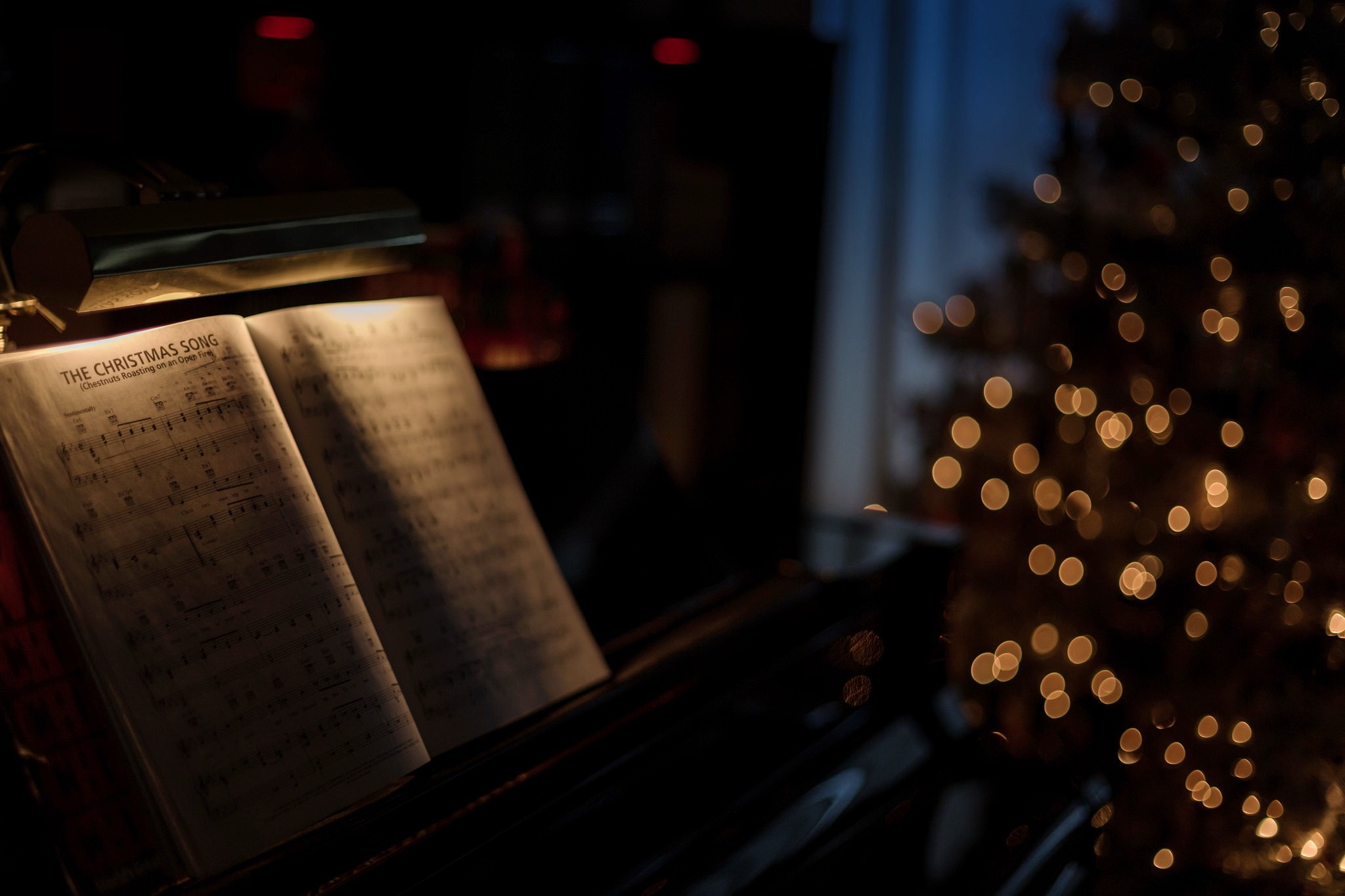 The Christmas Song sheet music on a piano HD Wallpaper