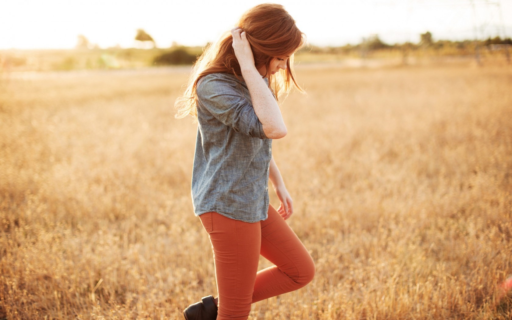 Model in a field at sunset HD Wallpaper