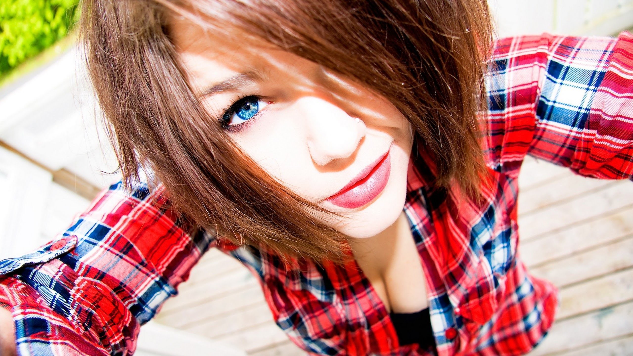 Young woman with blue eyes wearing a plaid shirt HD Wallpaper