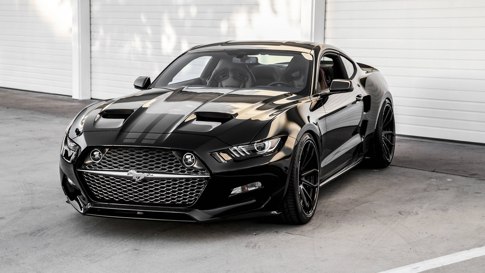 Black Ford Mustang GT with racing stripes HD Wallpaper