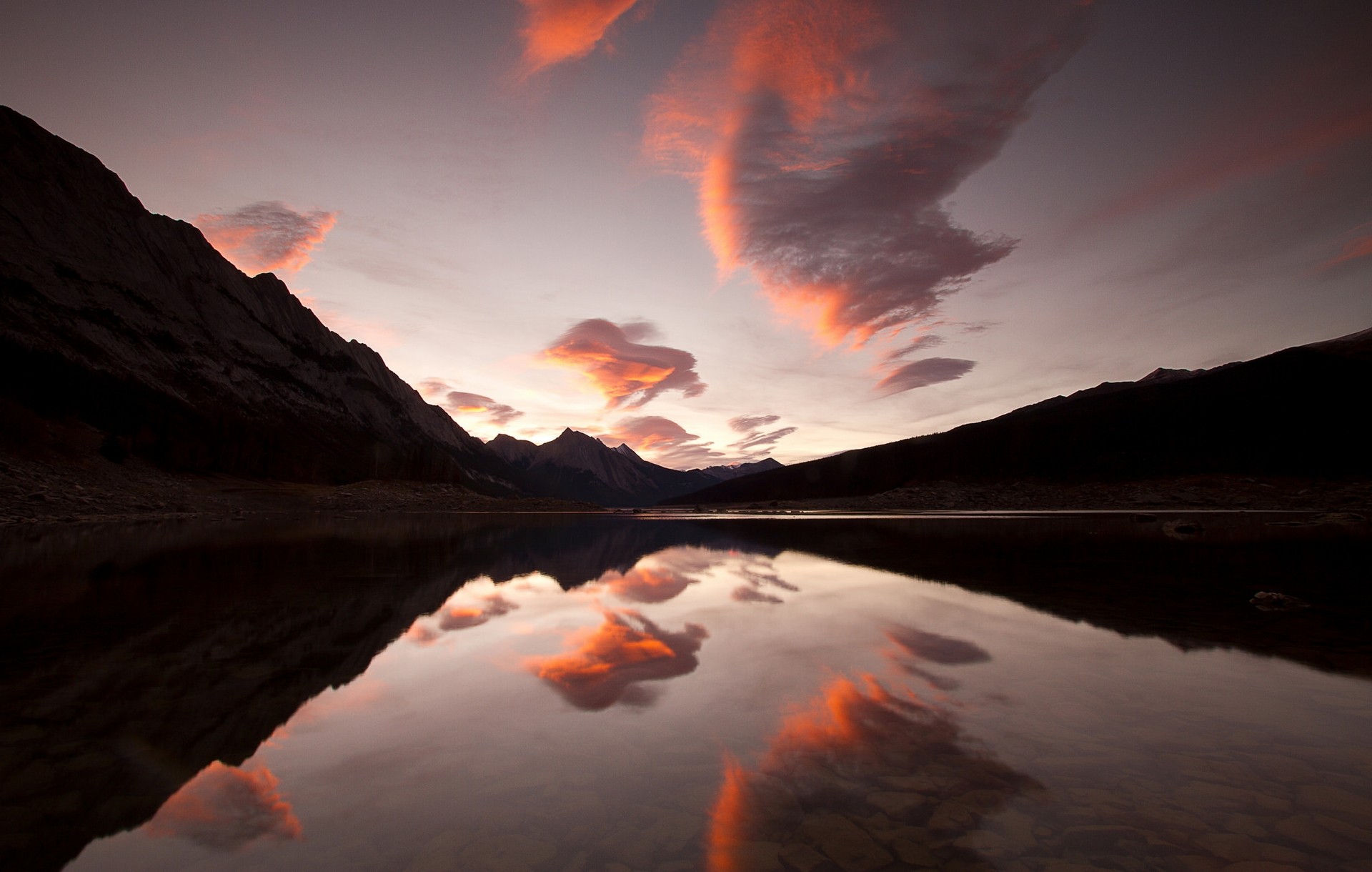 Sunset clouds reflected in a mountain lake HD Wallpaper