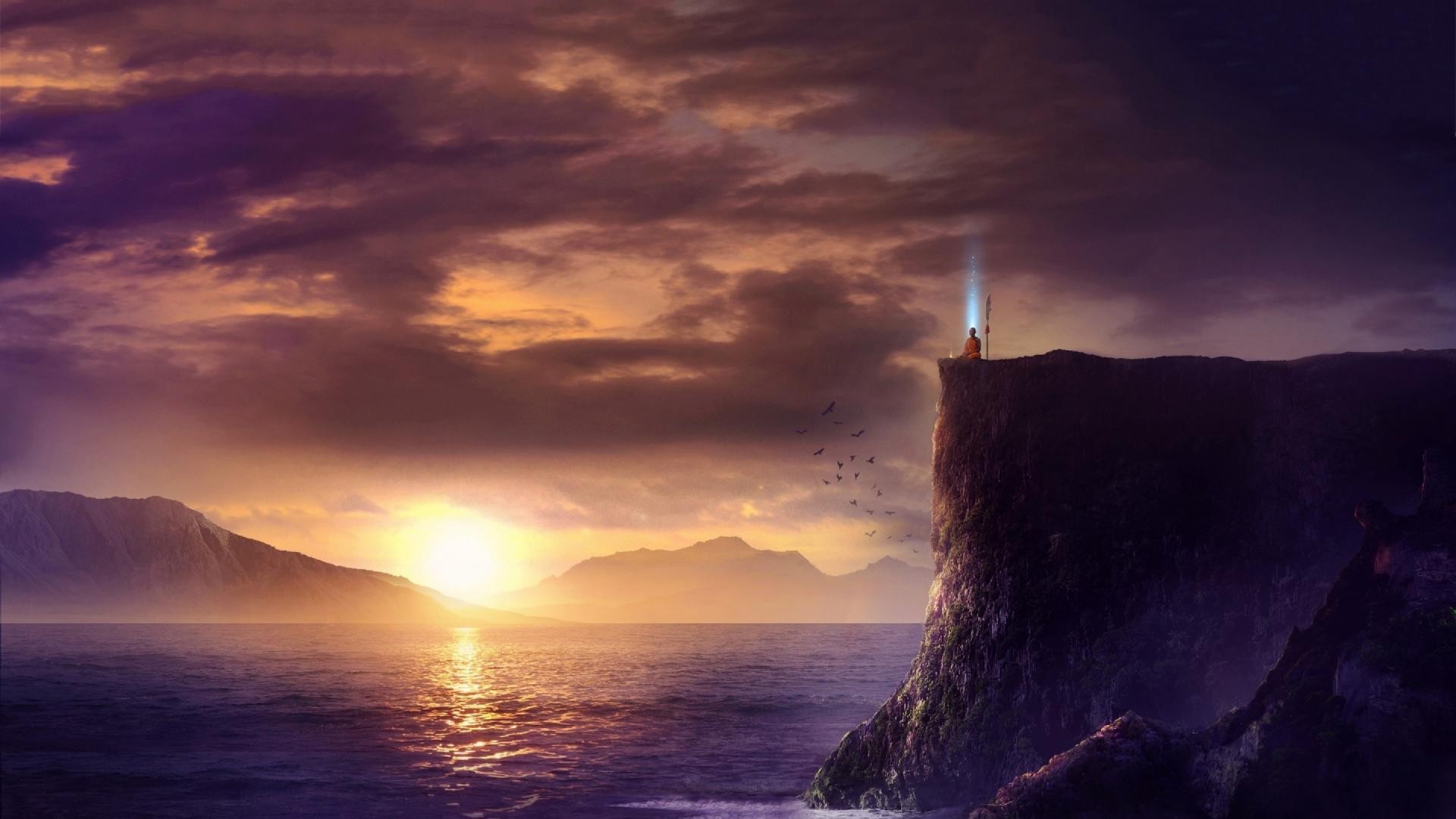 Monk meditating on a cliff at sunset over the sea HD Wallpaper