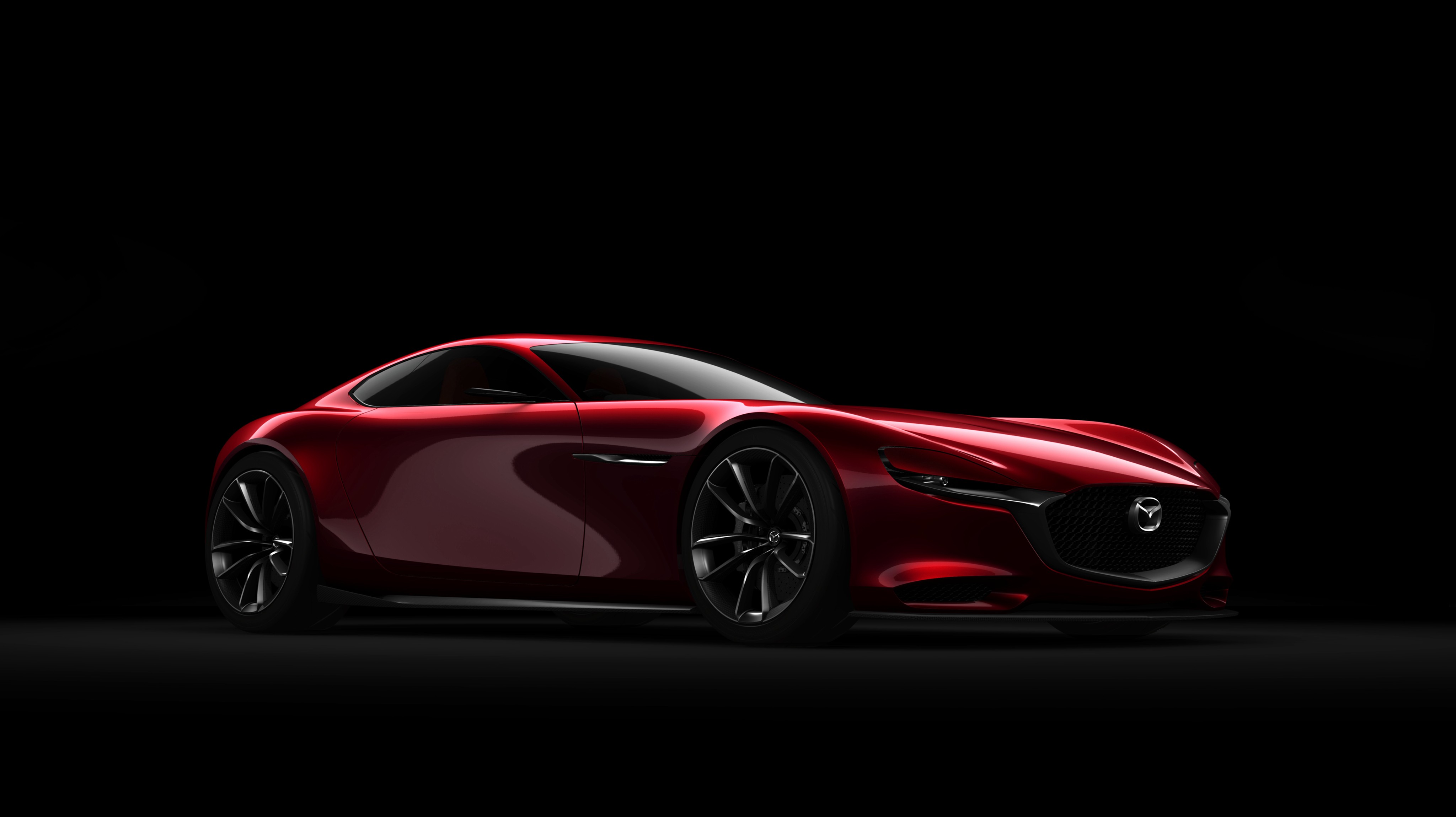 Red Mazda sports car on a black background HD Wallpaper
