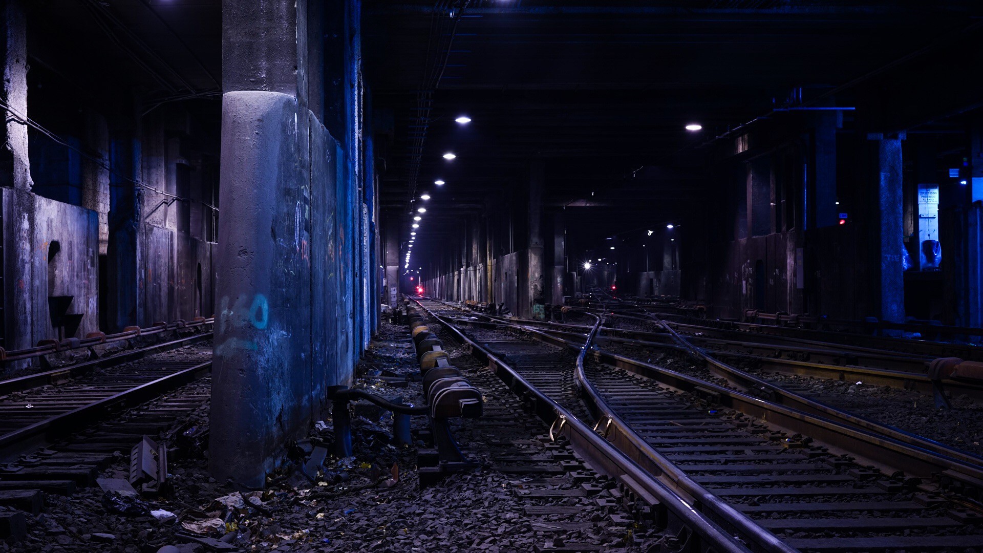 Subway tunnel with multiple railway tracks HD Wallpaper