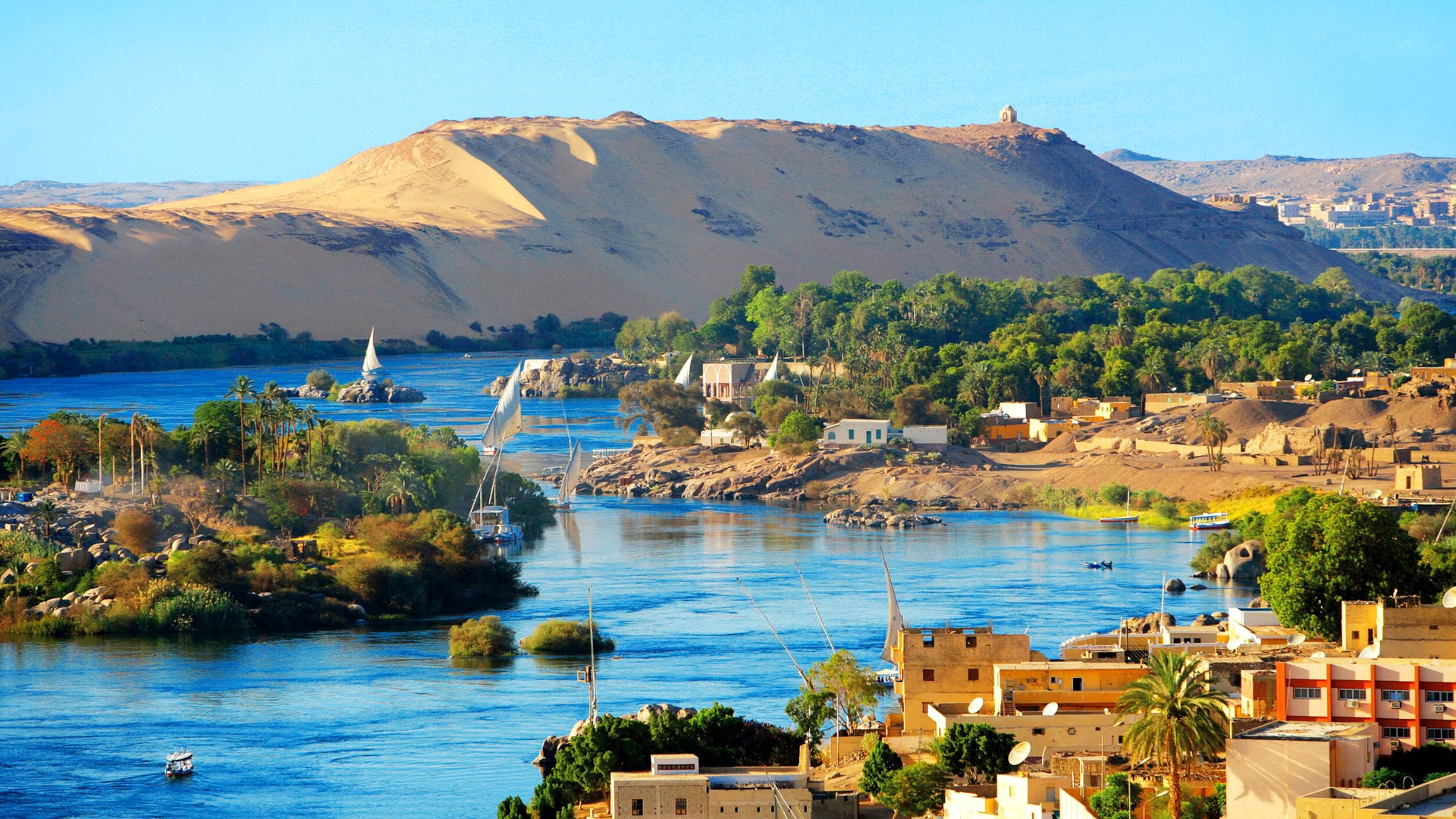Nile River landscape with feluccas and desert hills HD Wallpaper