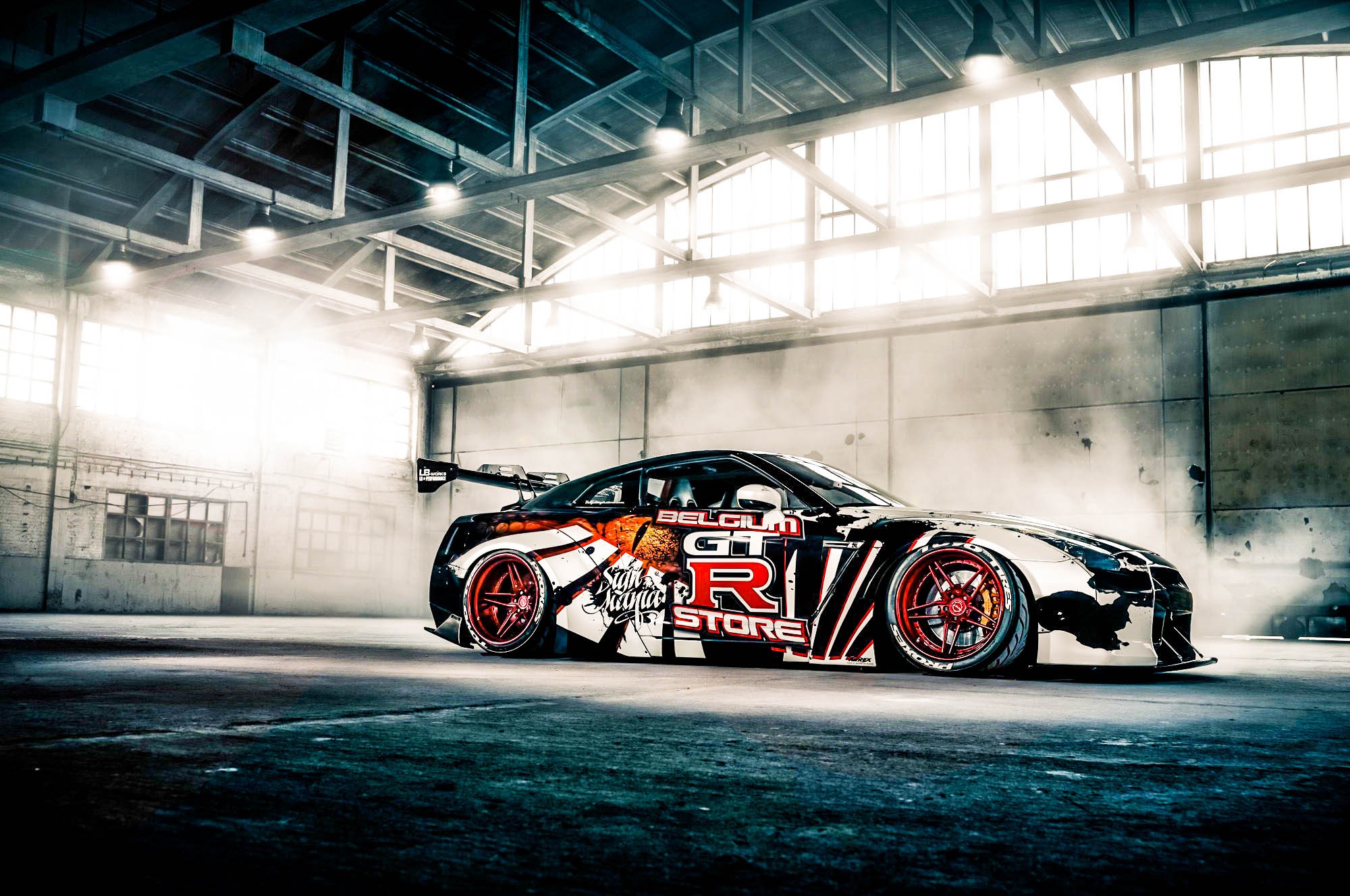 Nissan GT-R in a smoky garage HD Wallpaper