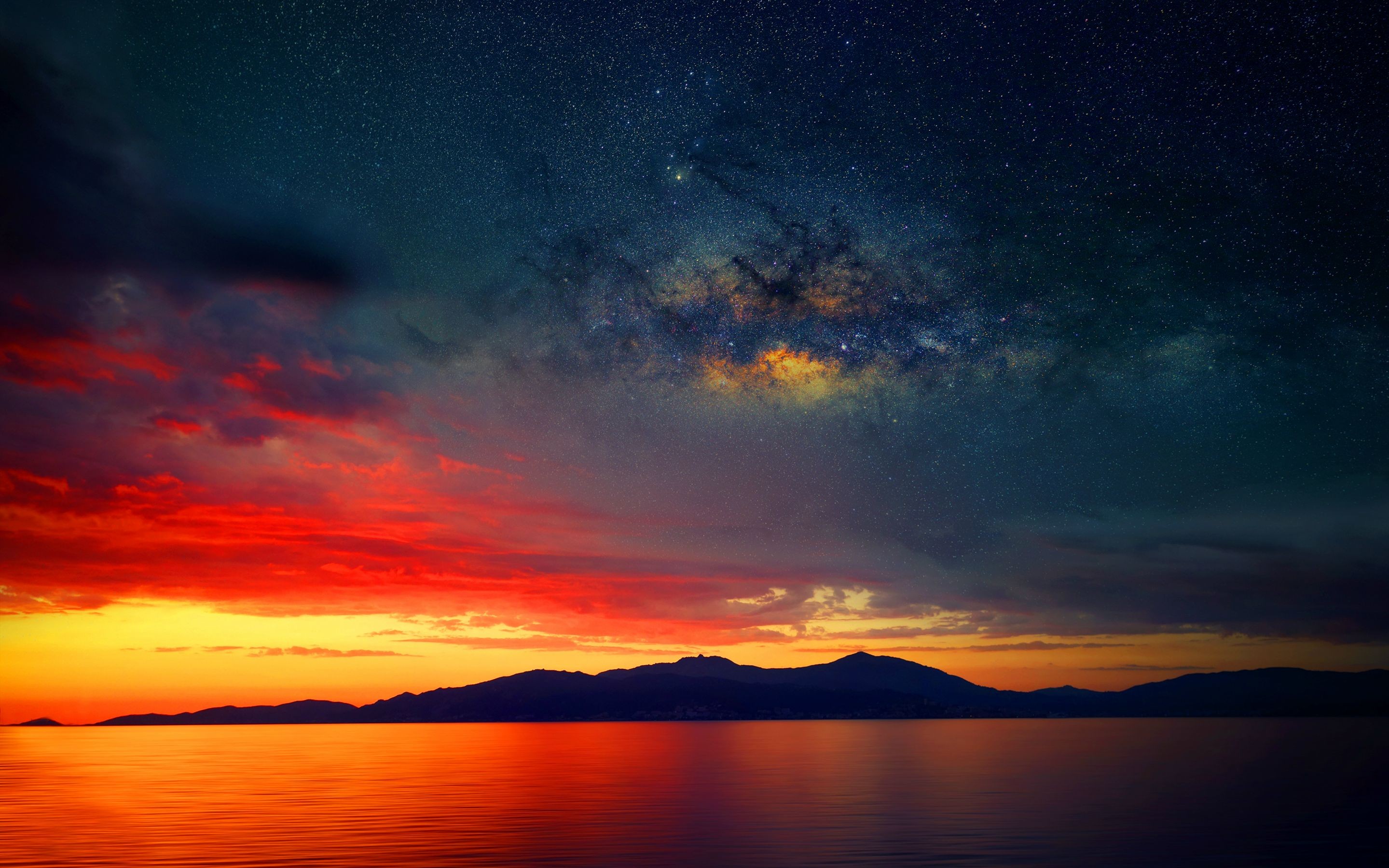 Sunset and Milky Way over mountains and ocean HD Wallpaper