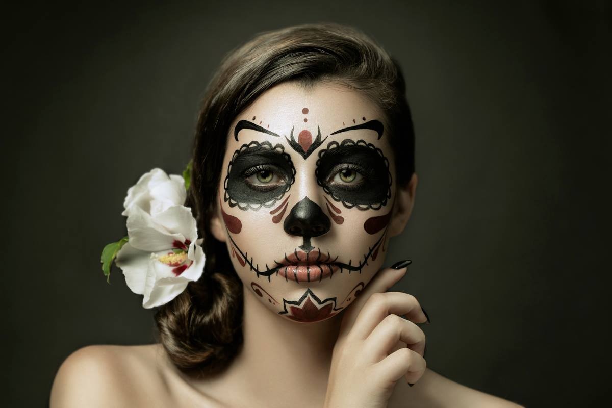 Woman with Sugar Skull makeup and white flower HD Wallpaper
