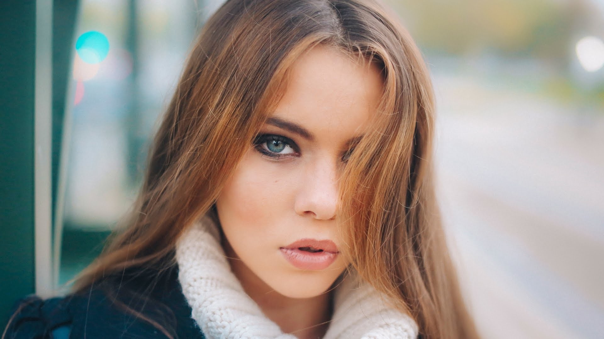 Woman with long brown hair and blue eyes HD Wallpaper