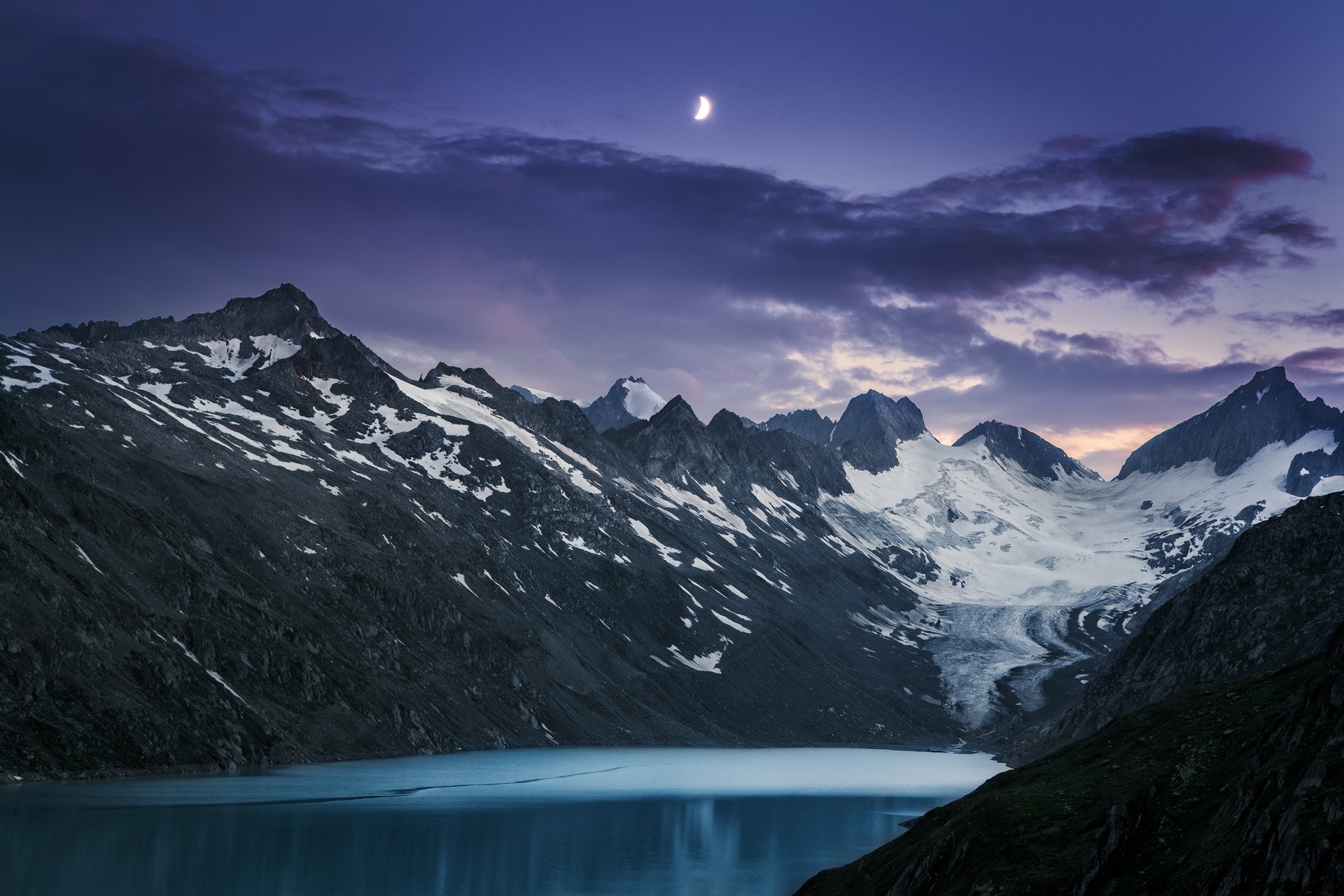 Moonlit mountain range with glaciers and a lake HD Wallpaper