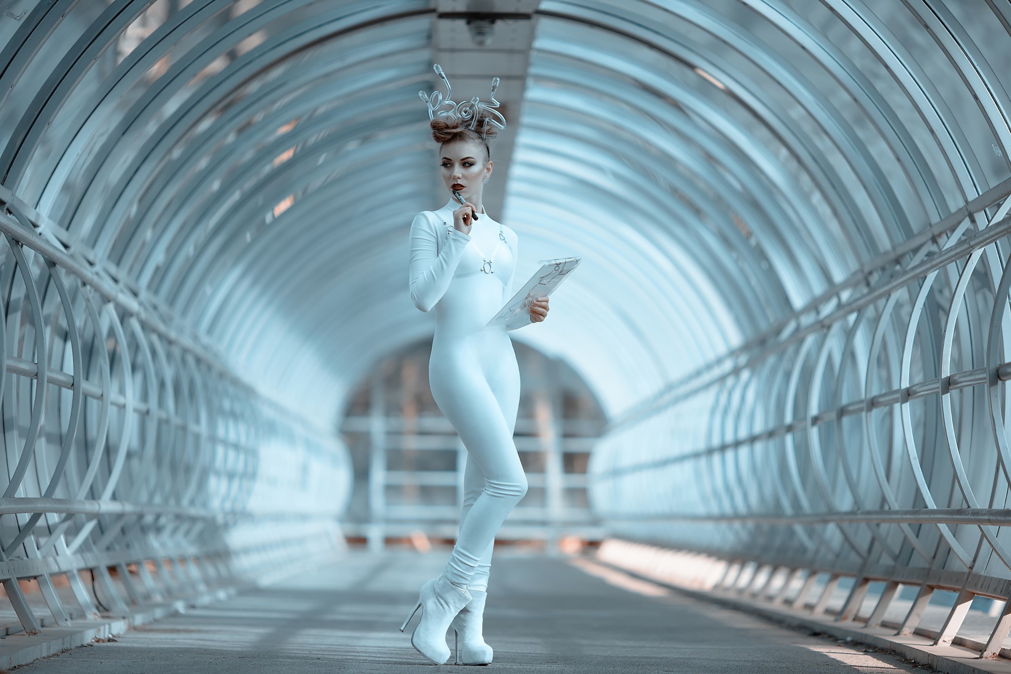 Woman in white futuristic outfit in a tunnel HD Wallpaper