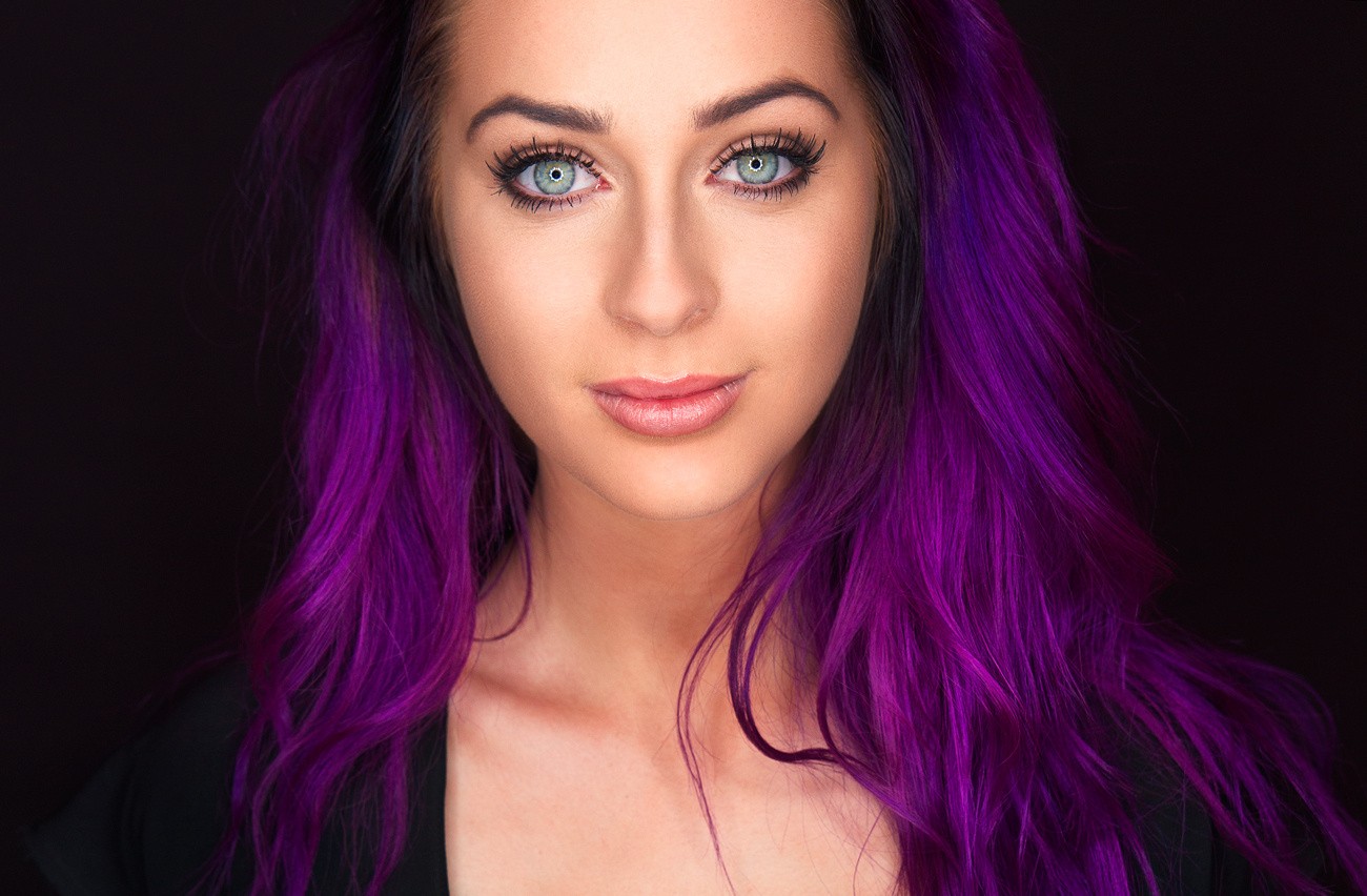 Woman with purple dyed hair and blue eyes HD Wallpaper