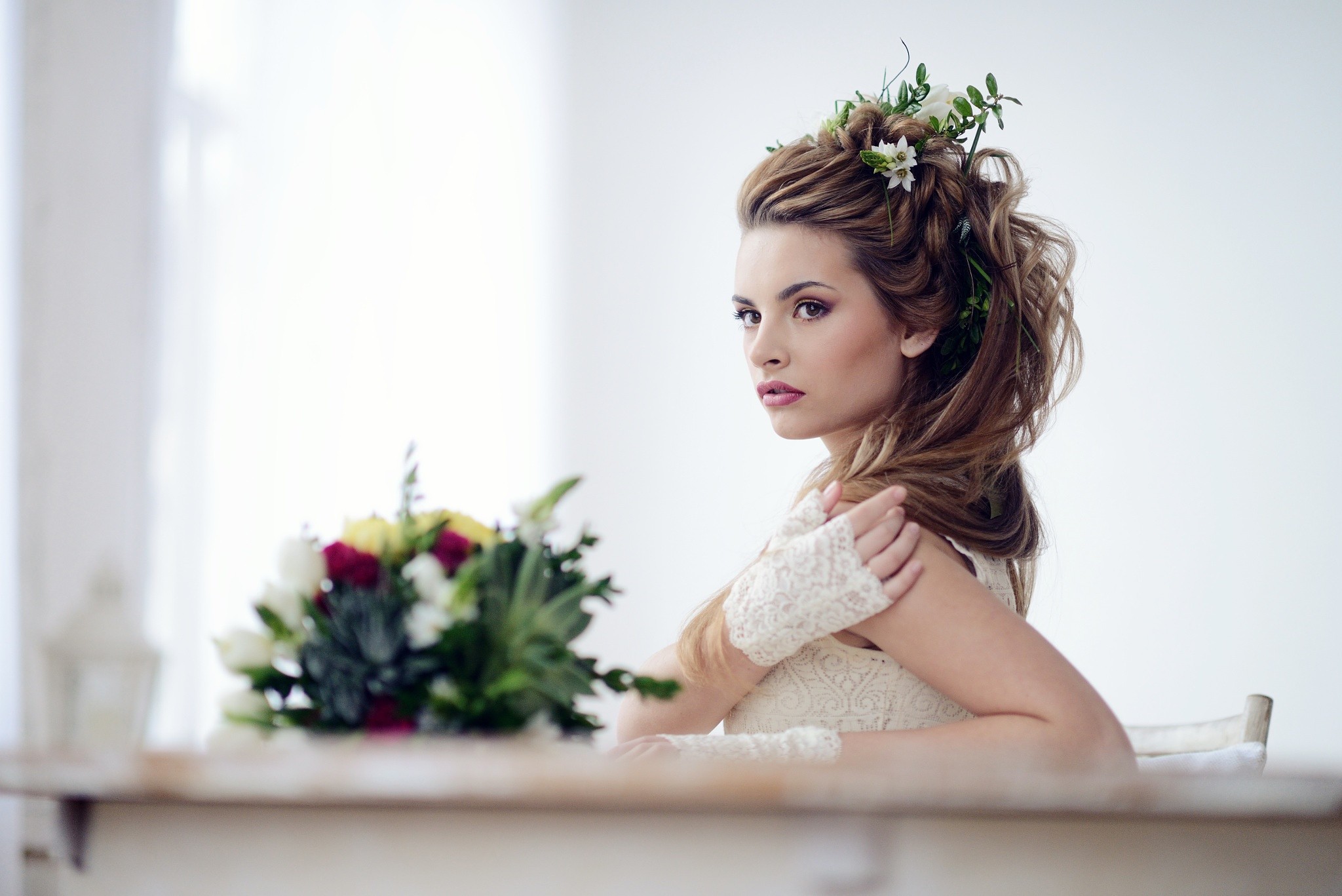 Woman with flowers in her hair and a bouquet HD Wallpaper
