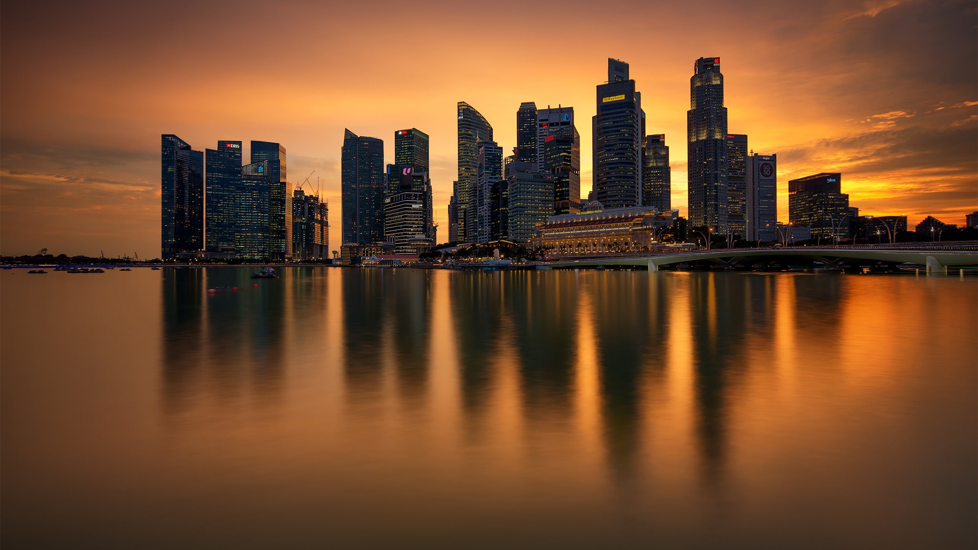Singapore skyline at sunset with reflections HD Wallpaper
