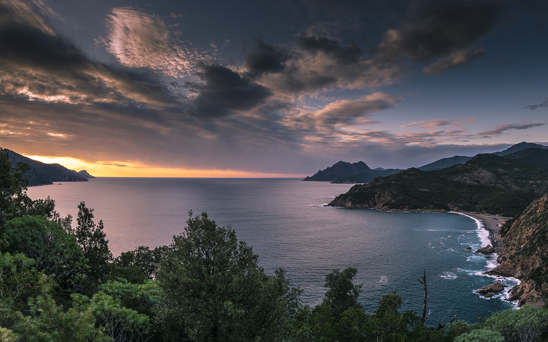 Coastal landscape at sunset with dramatic clouds HD Wallpaper