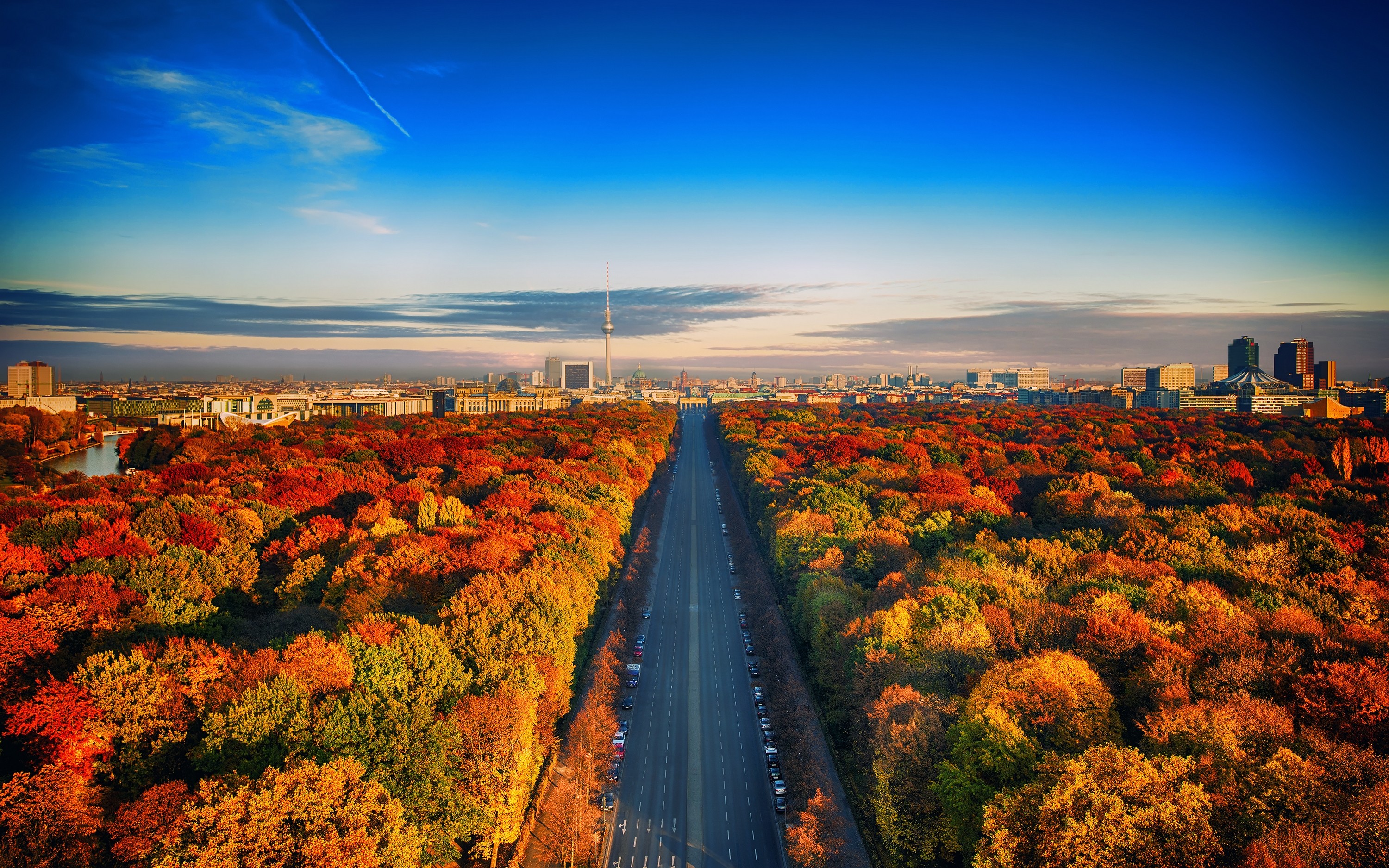 Berlin cityscape with trees in autumn colors and a highway HD Wallpaper