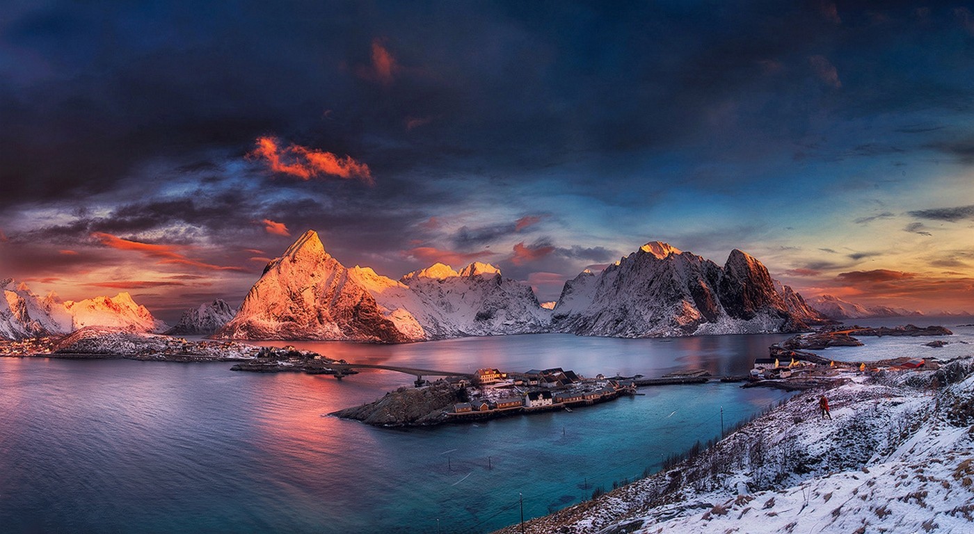 Snowy mountains and villages in Norway at sunset HD Wallpaper