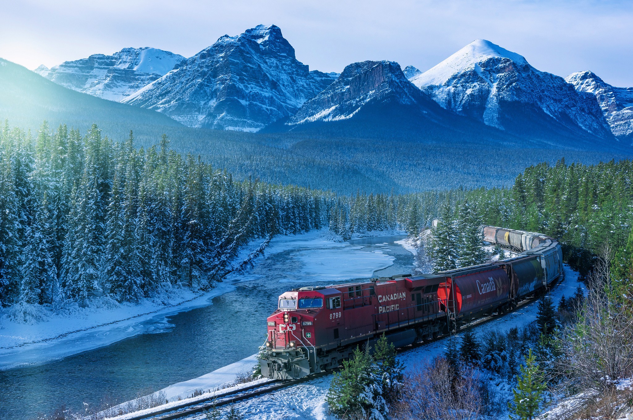 Canadian Pacific train in a snowy mountain landscape HD Wallpaper