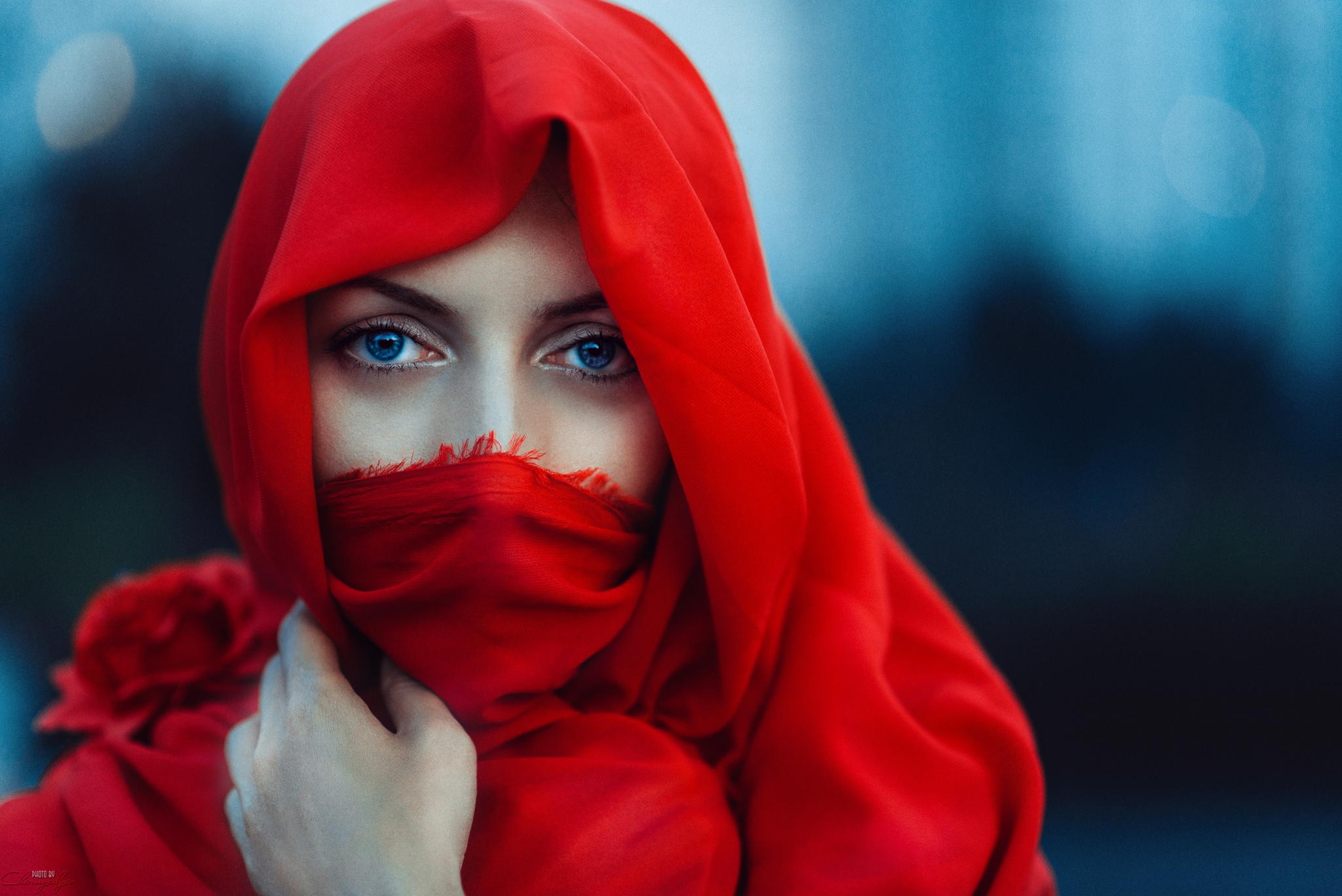 Woman with blue eyes wearing a red headscarf HD Wallpaper