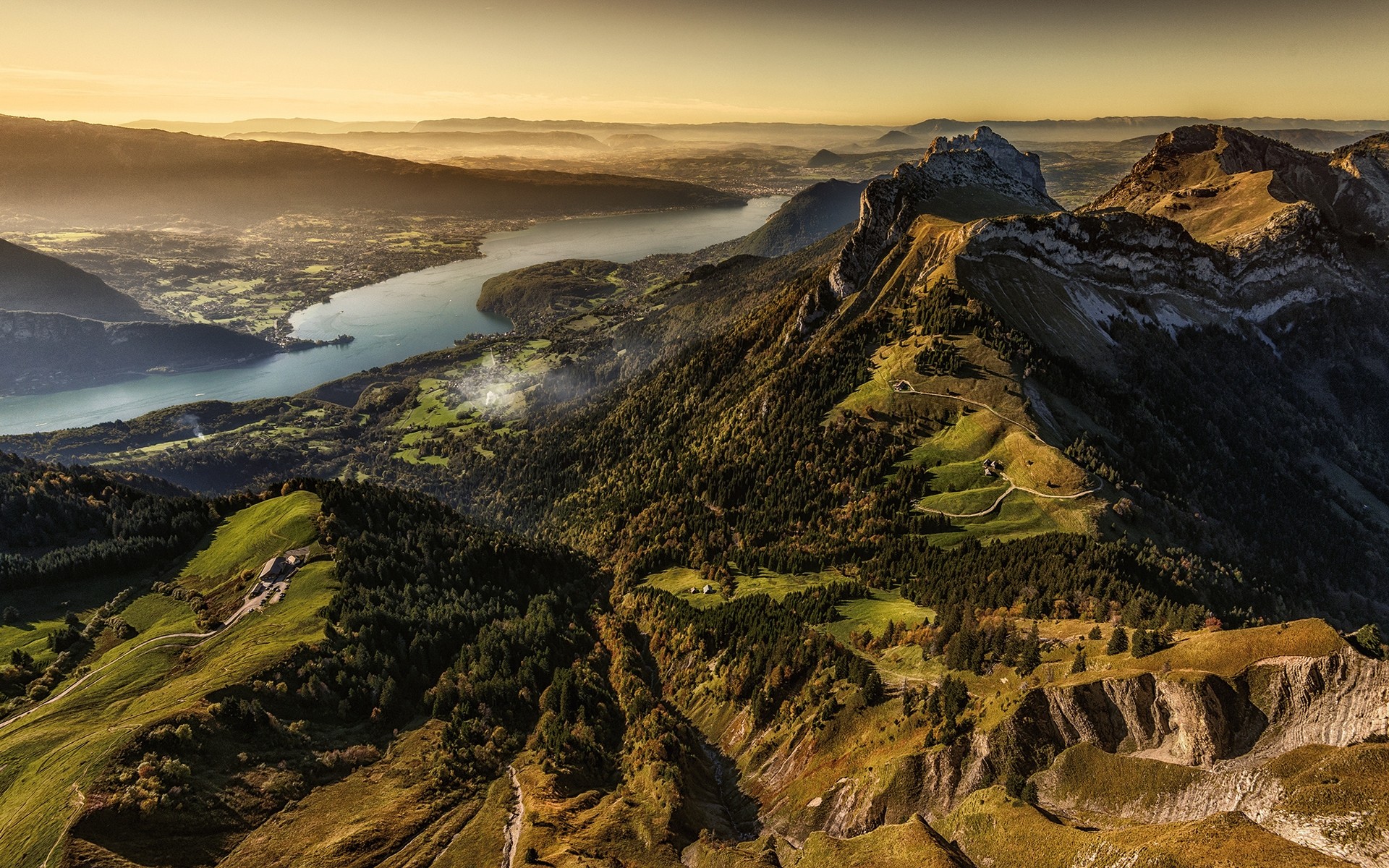 Aerial view of mountains and lake in France HD Wallpaper