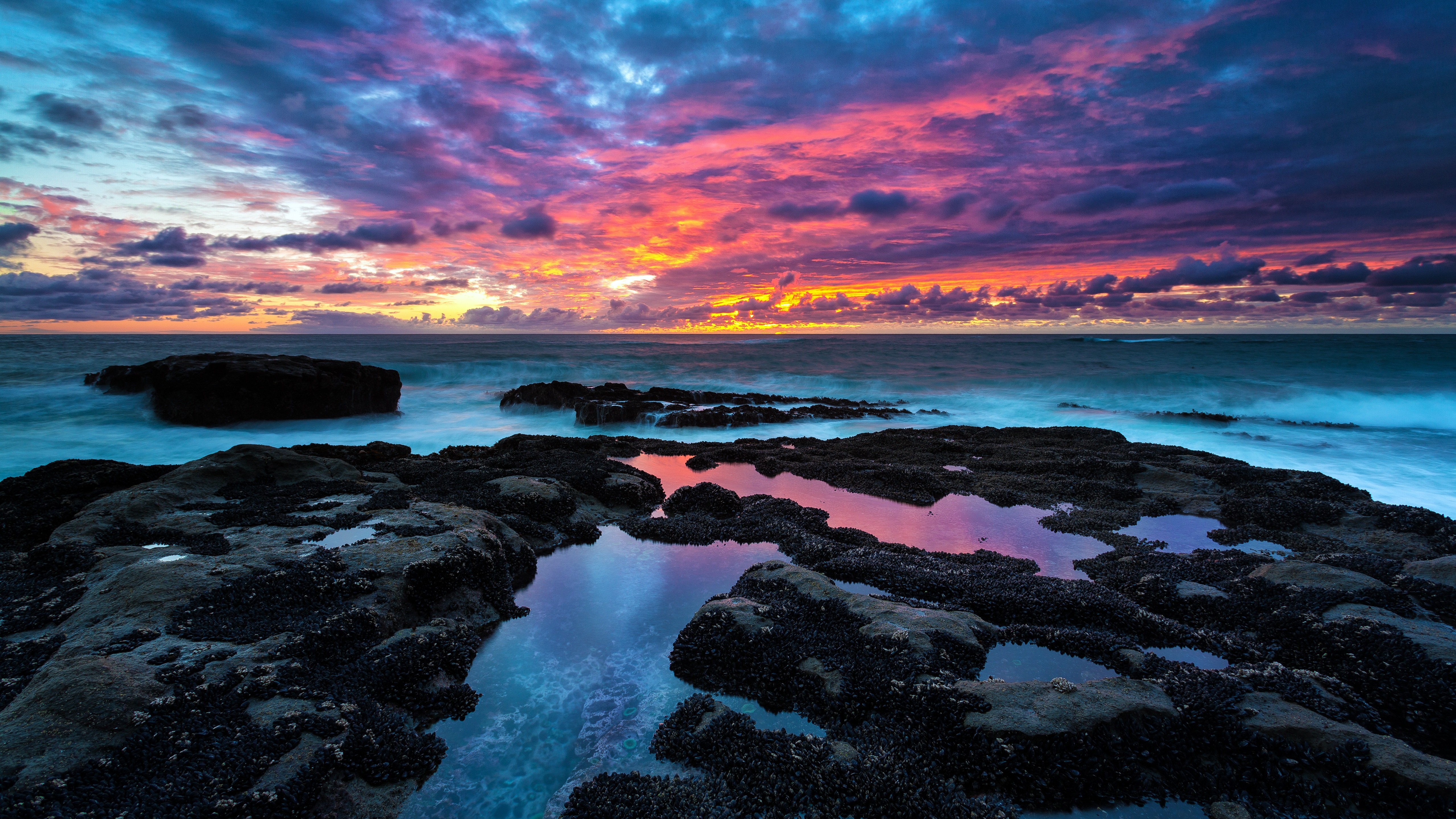 Sunset over the ocean at Cape Arago, Oregon HD Wallpaper