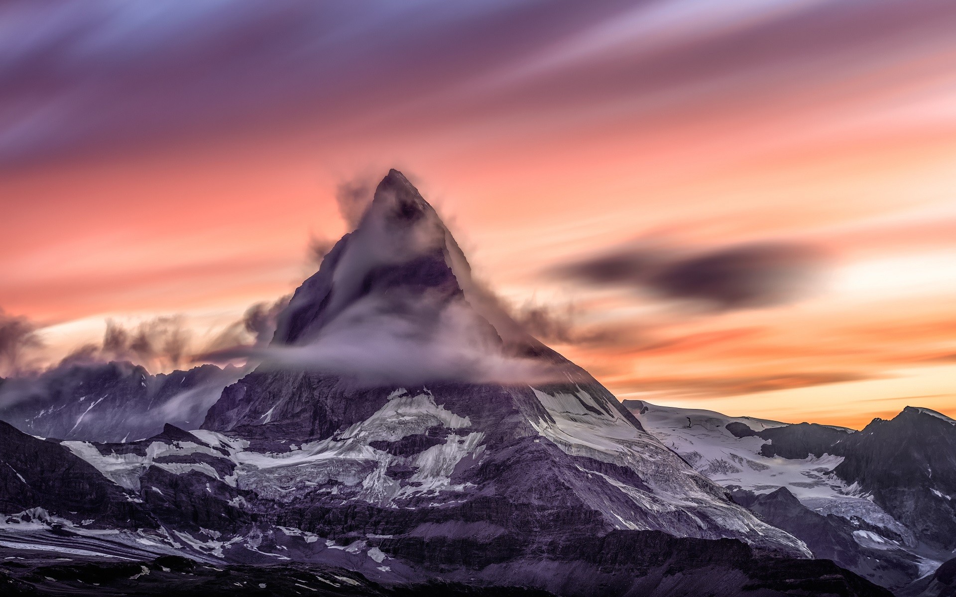 Matterhorn mountain at sunset with clouds in the Alps HD Wallpaper