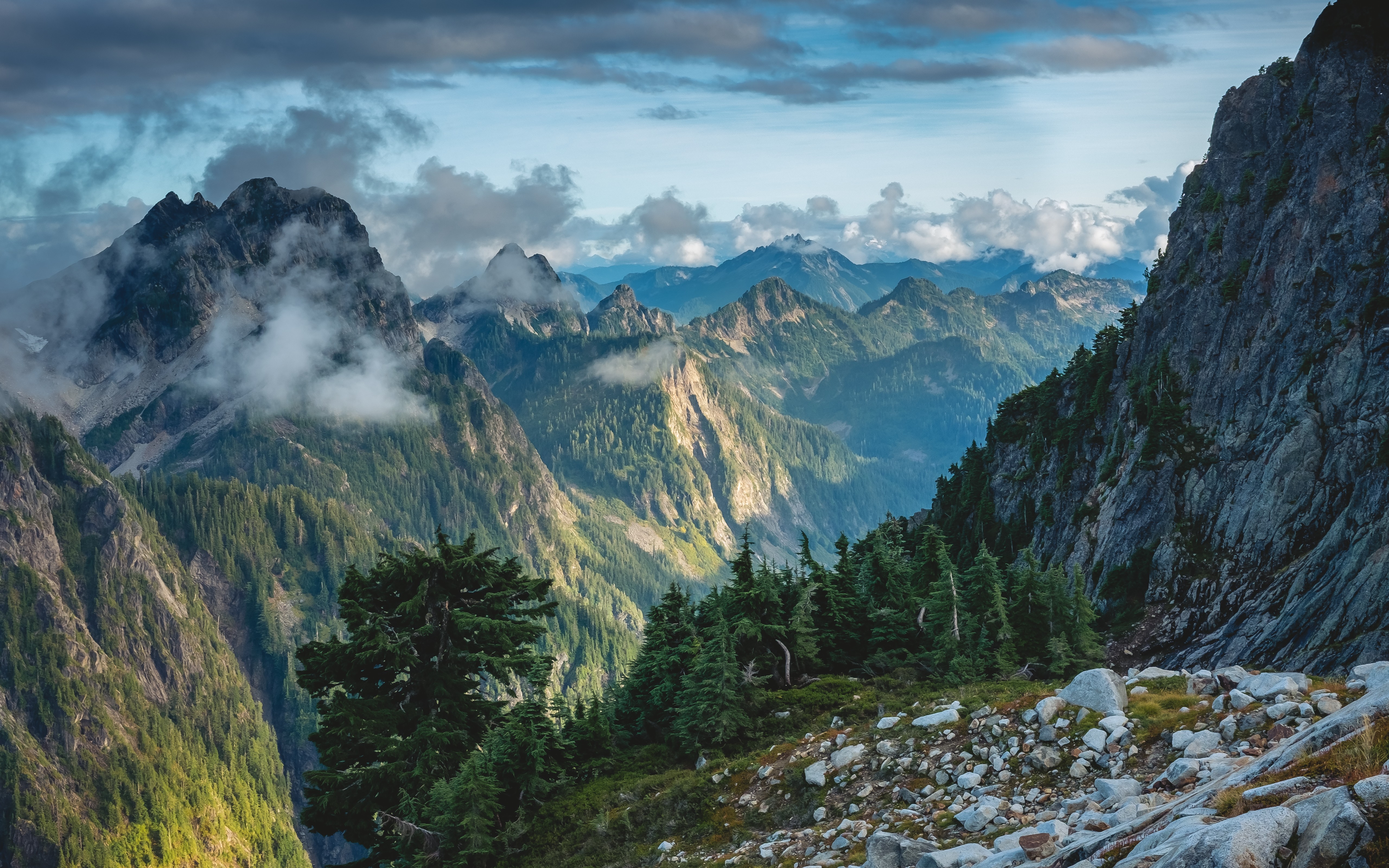 Mountain range with clouds and trees HD Wallpaper