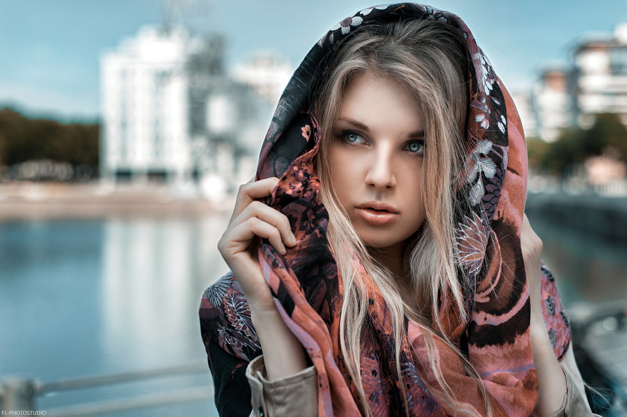 Woman with a patterned scarf over her head HD Wallpaper