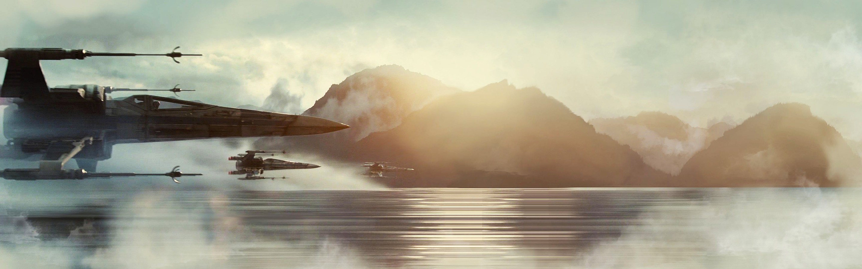Star Wars X-wings fly over a misty lake with mountains HD Wallpaper