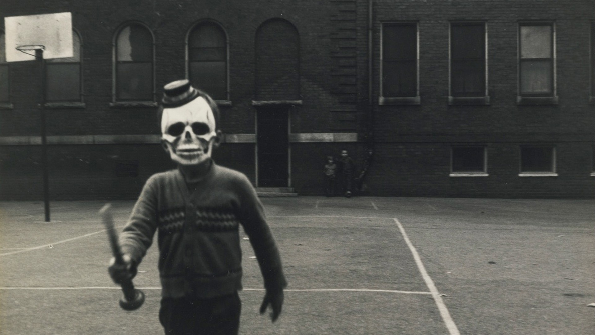 Boy in skull mask holding a baseball bat HD Wallpaper