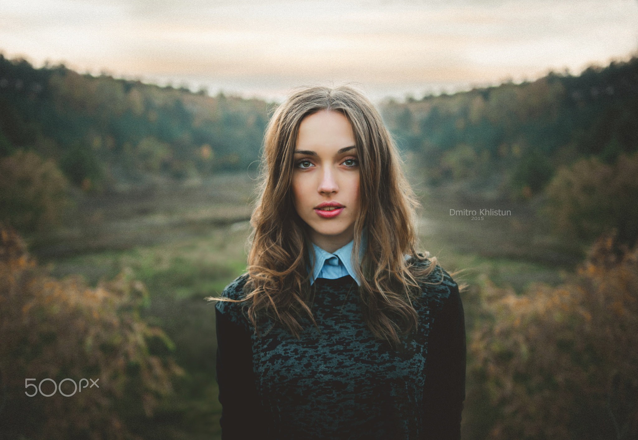 Portrait of a young woman in a natural setting HD Wallpaper