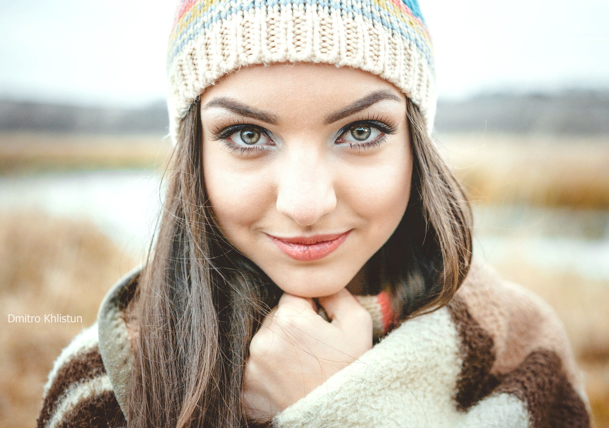 Woman in Beanie and Cape Looking at Viewer HD Wallpaper