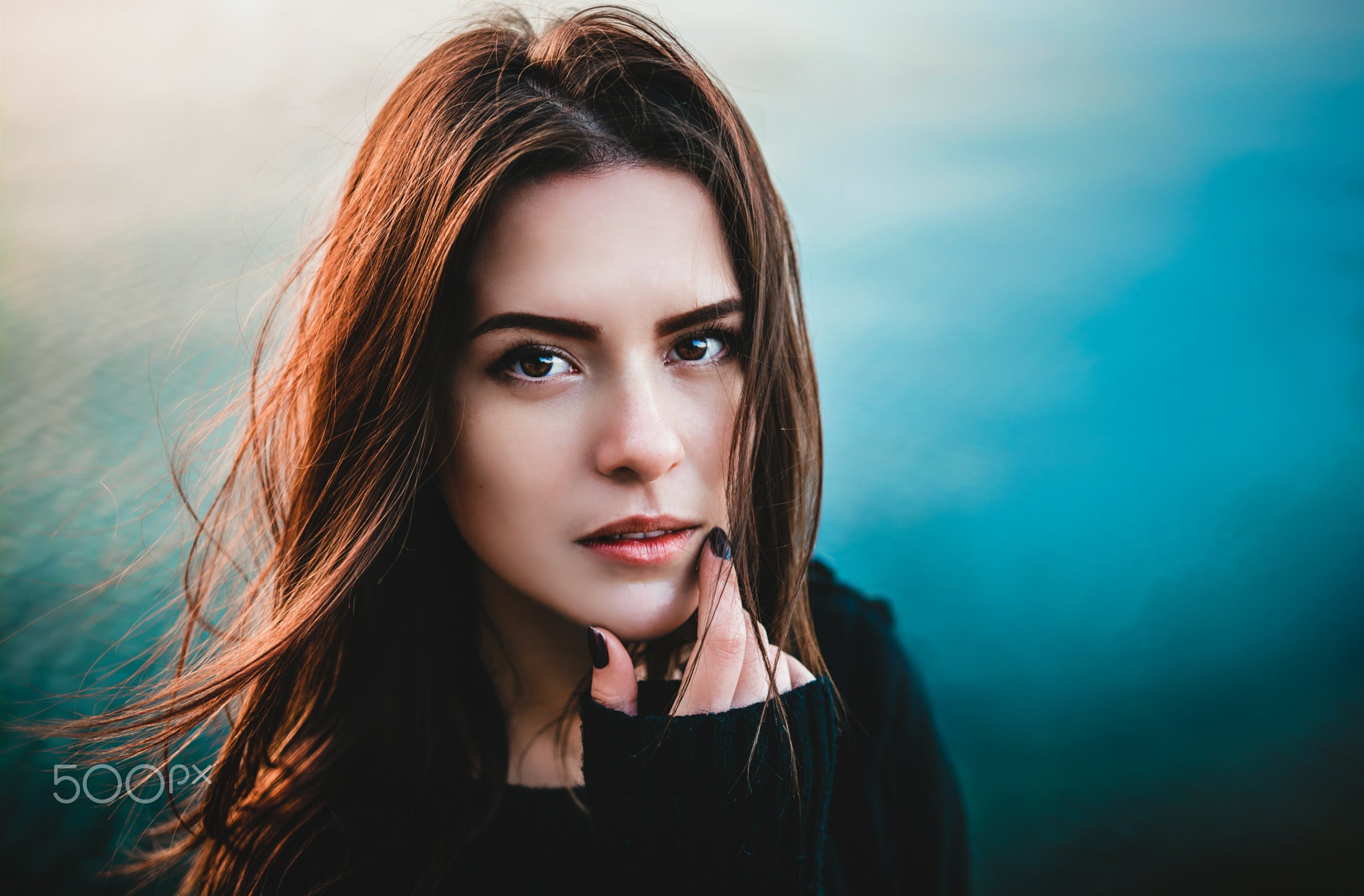 Woman with long brown hair in a black sweater HD Wallpaper