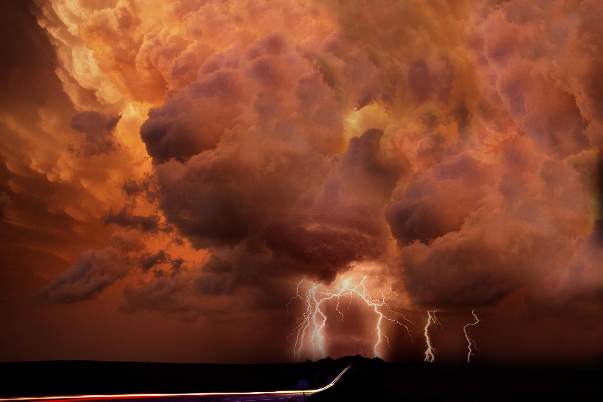 Lightning strikes through dramatic storm clouds HD Wallpaper