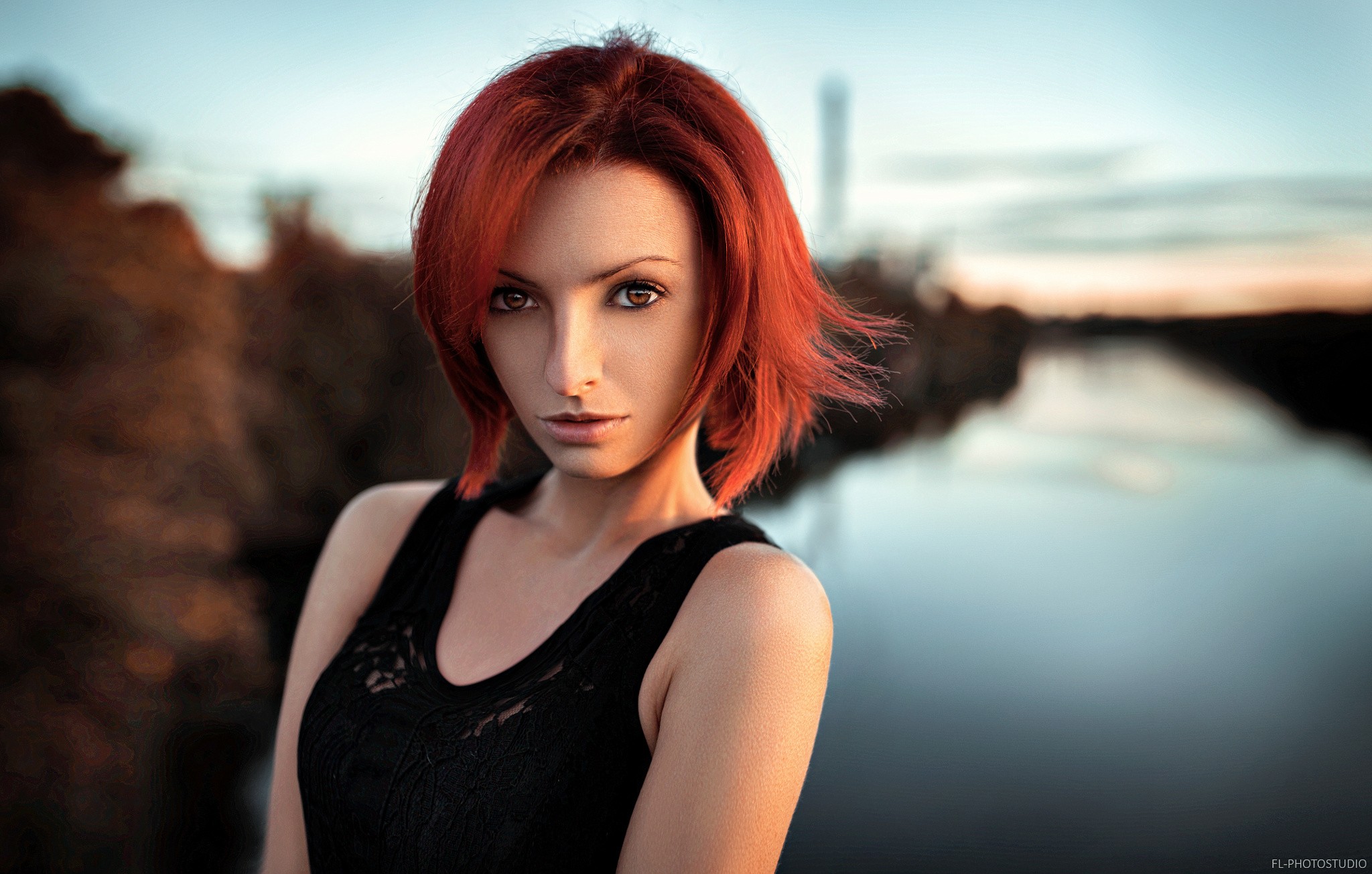 Redhead woman in black clothing with brown eyes HD Wallpaper