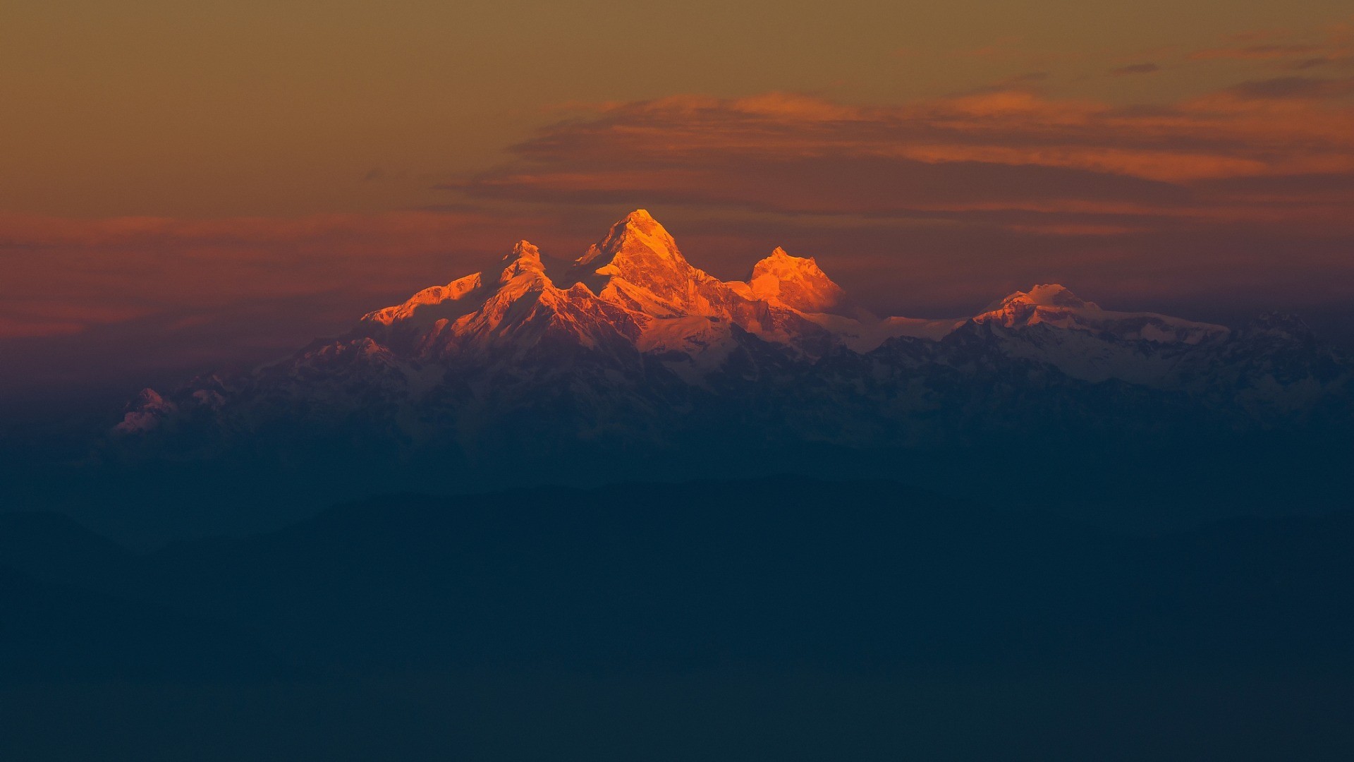Himalayas mountains at sunset with golden light HD Wallpaper