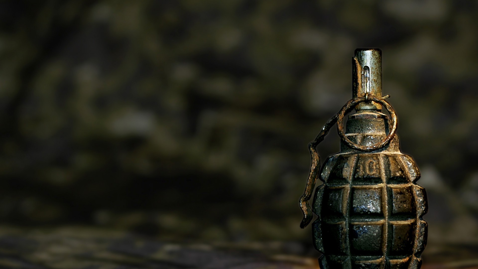 A close-up of a military hand grenade HD Wallpaper