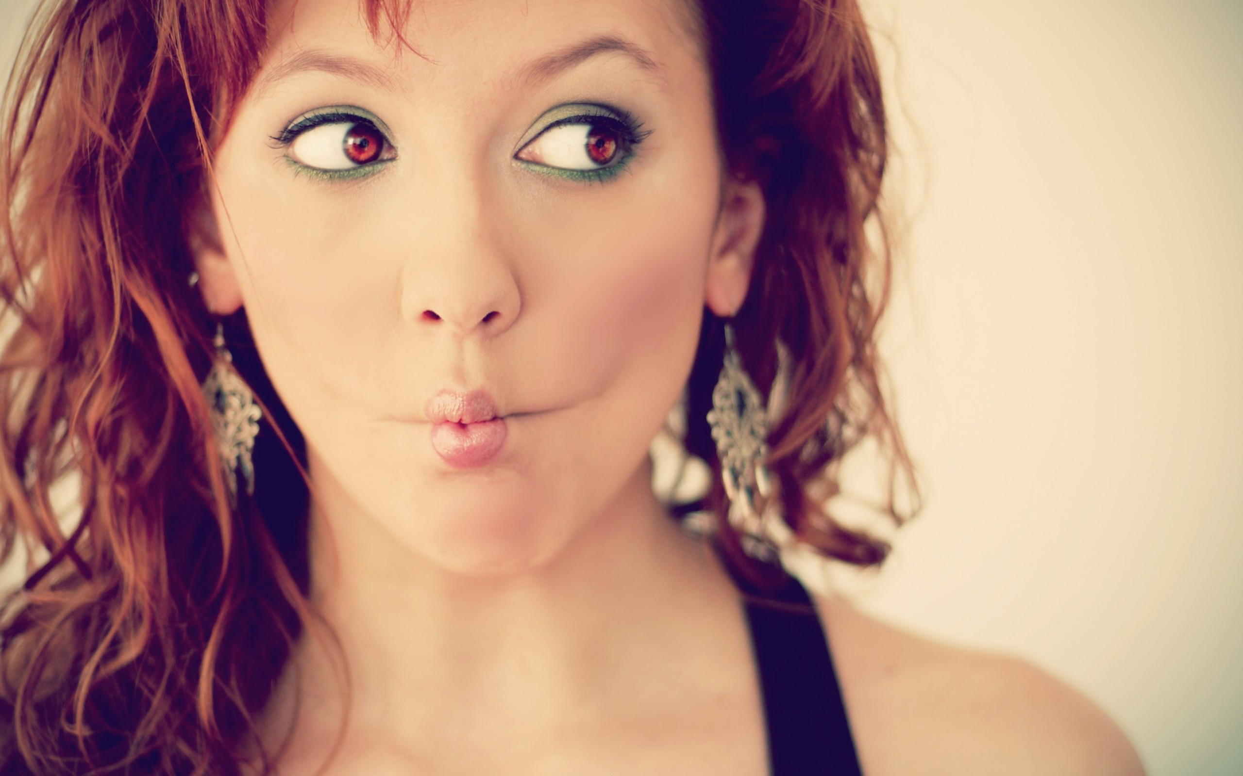 Woman with red hair making a fish face HD Wallpaper