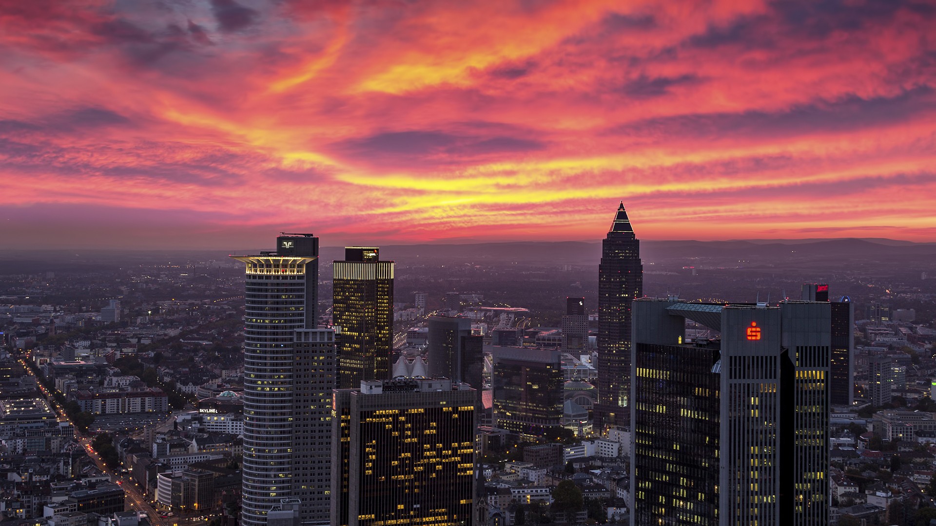 City skyline with skyscrapers at sunset HD Wallpaper