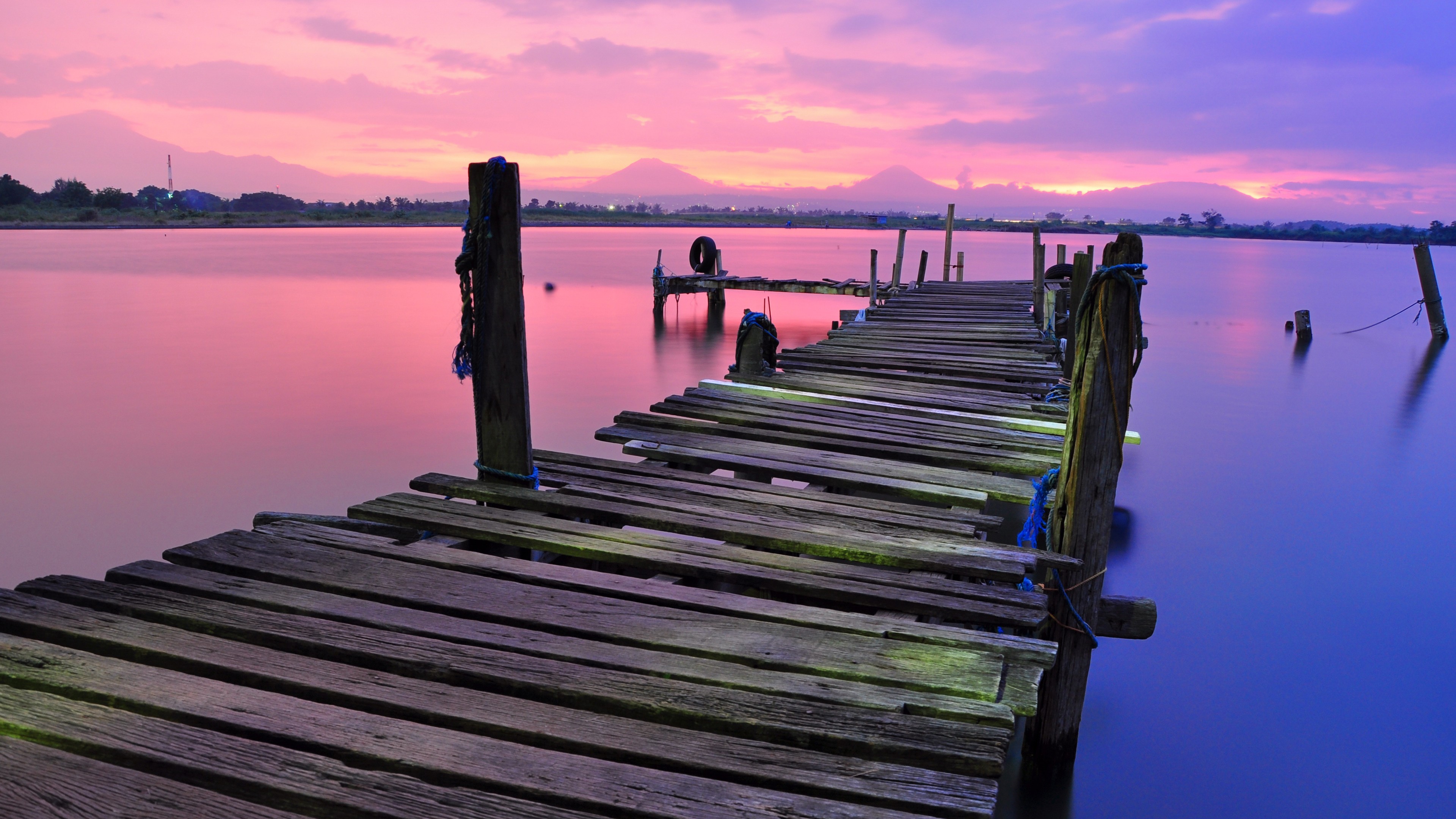 Wooden dock on a lake at sunset HD Wallpaper