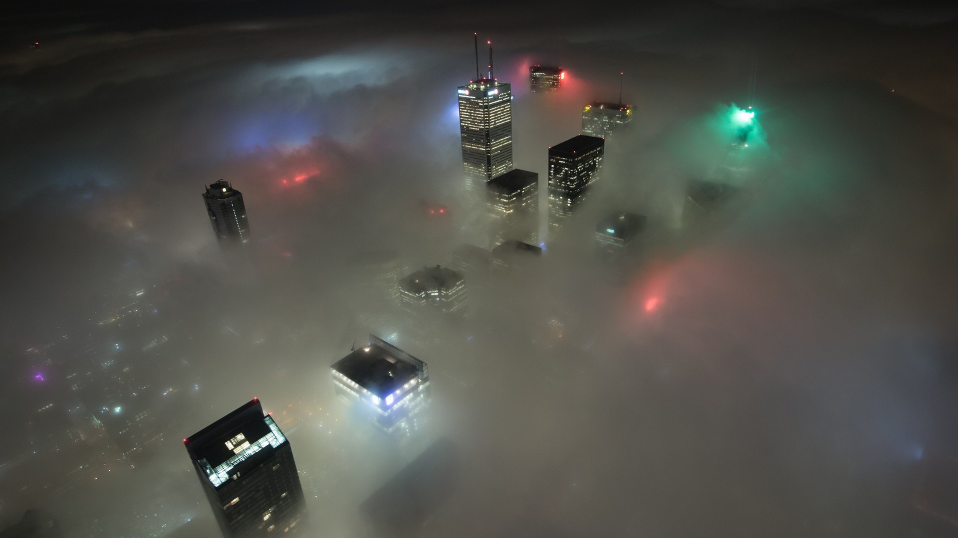 Toronto skyline shrouded in mist at night HD Wallpaper