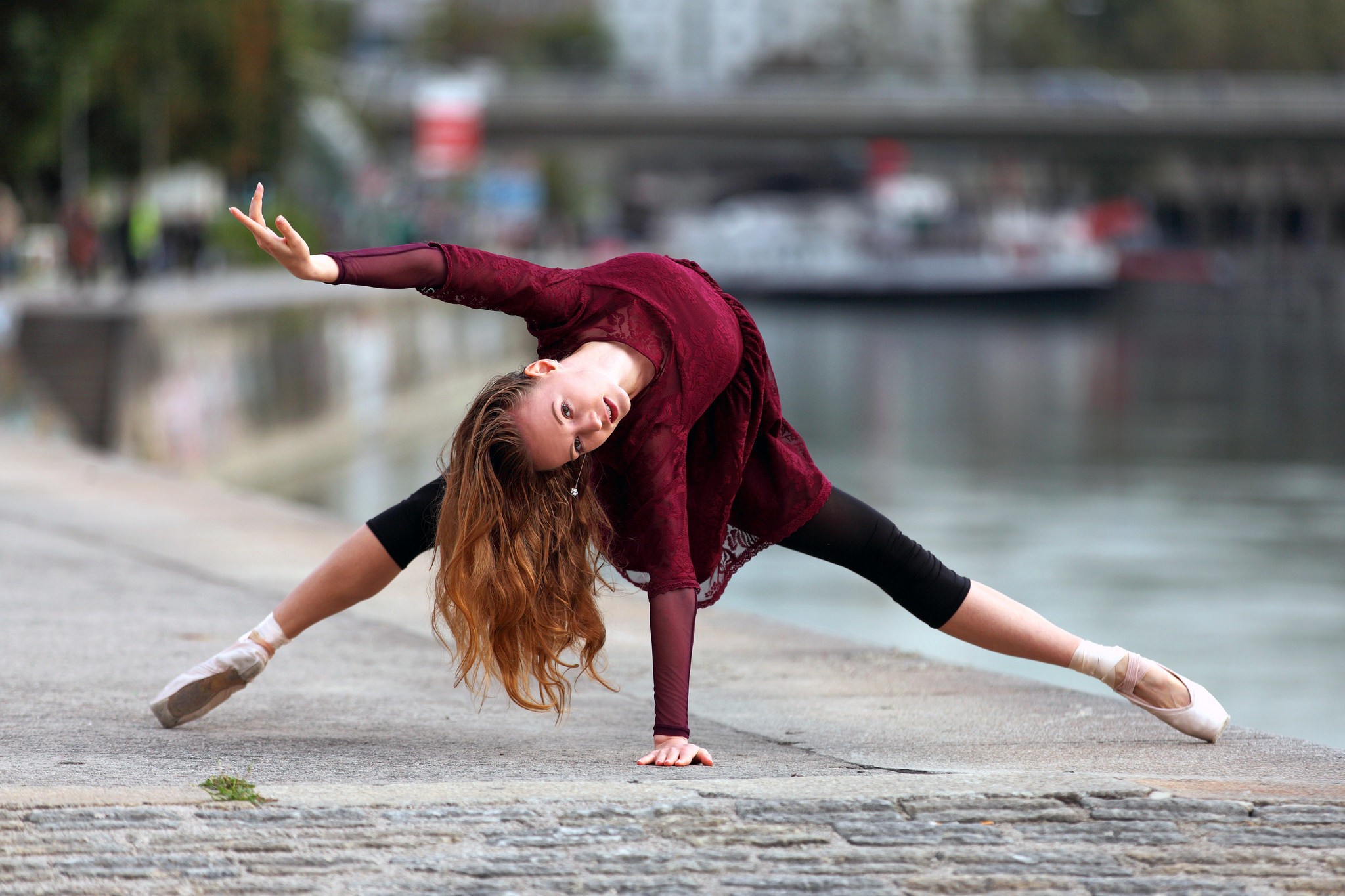 Ballerina with auburn hair dancing outdoors HD Wallpaper